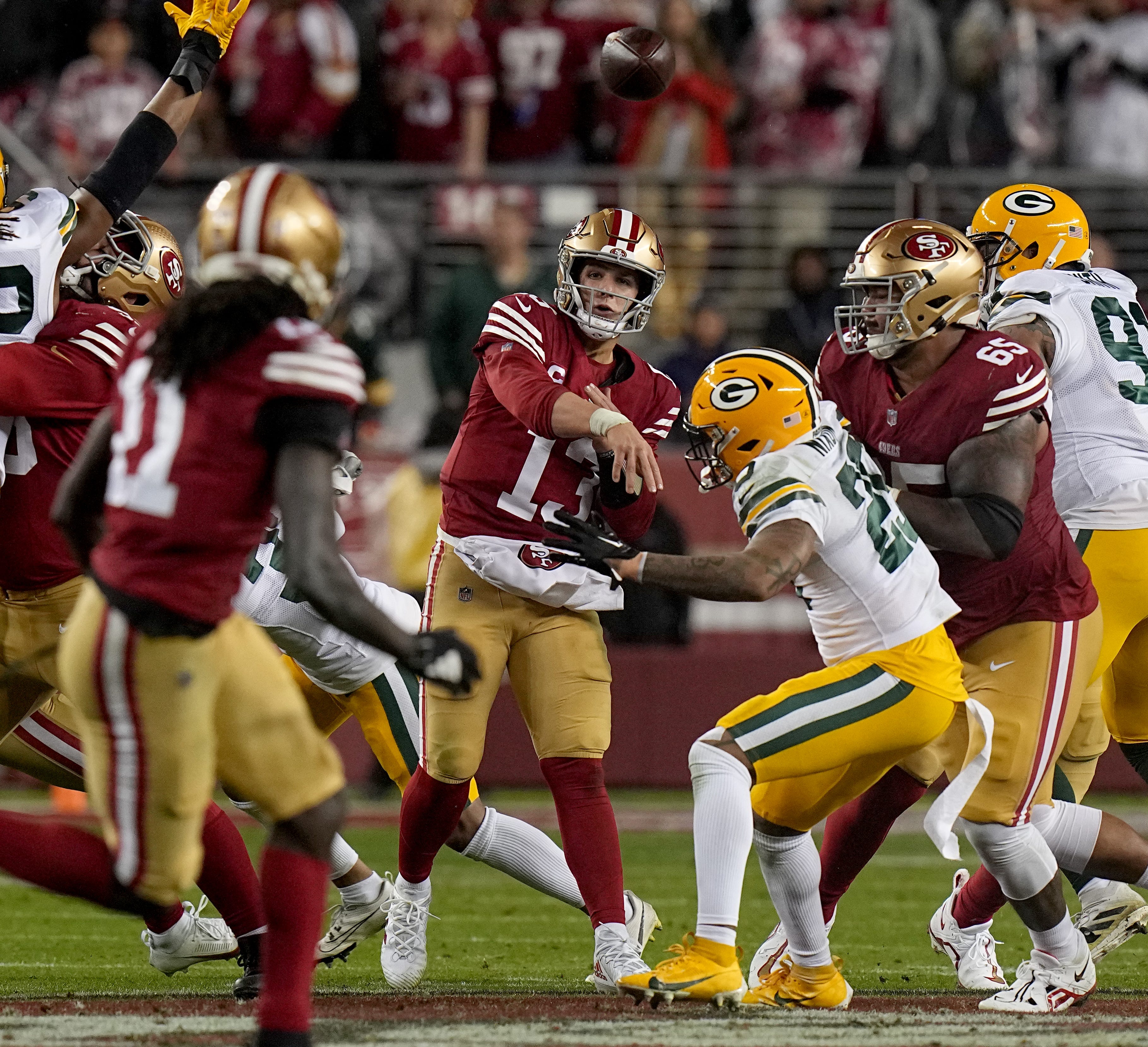 San Francisco 49ers quarterback Brock Purdy (13) throws a pass during the third quarter of their NFC divisional playoff game Saturday, January 20, 2024 at Levi’ Stadium in Santa Clara, California. The San Francisco 49ers beat the Green Bay Packers 24-21.