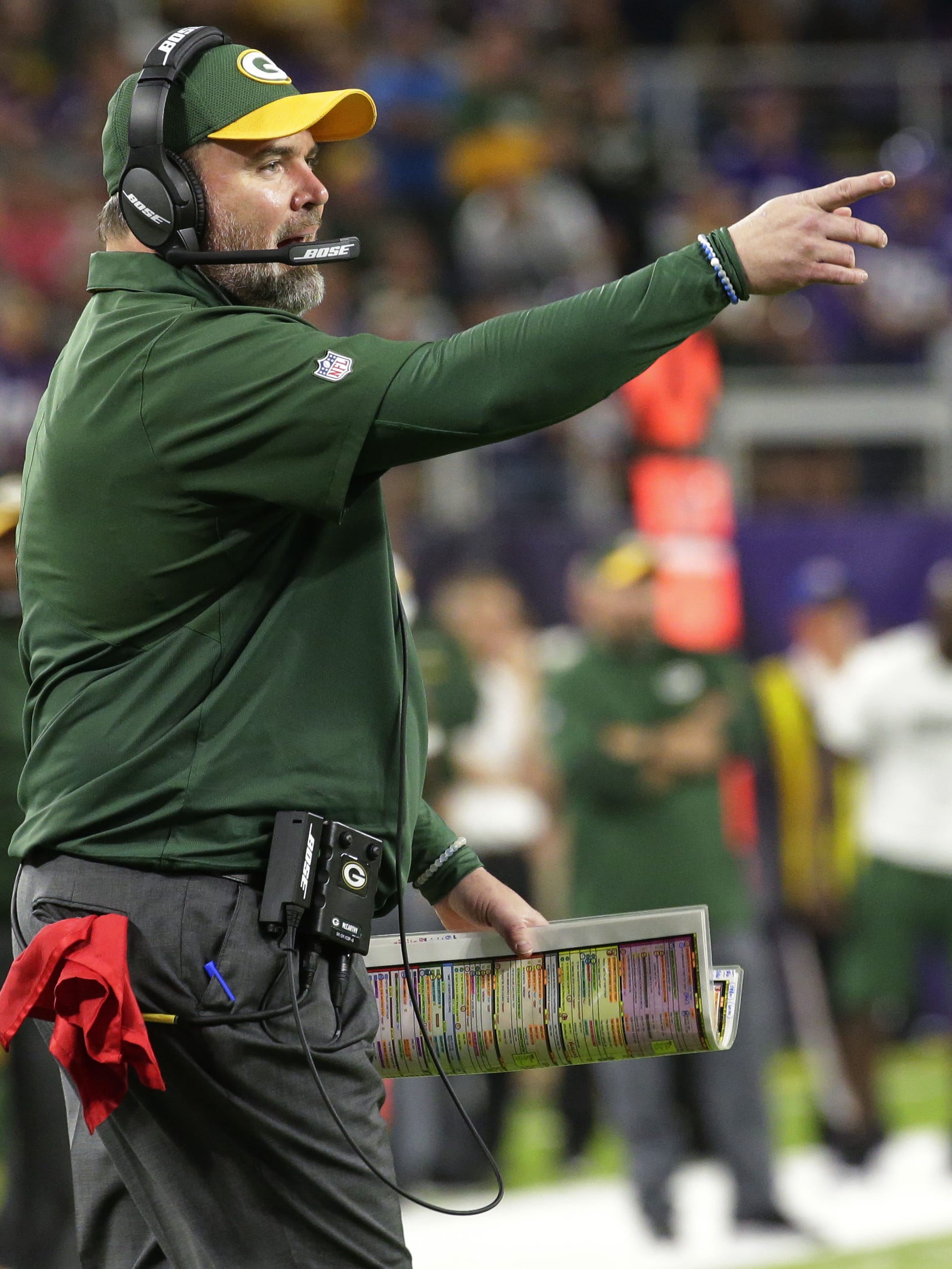 Green Bay Packers coach Mike McCarthy talks to officials after center JC Tretter was called for unsportsmanlike conduct during the fourth quarter on Sept. 18, 2016, at U.S. Bank Stadium in Minneapolis.
