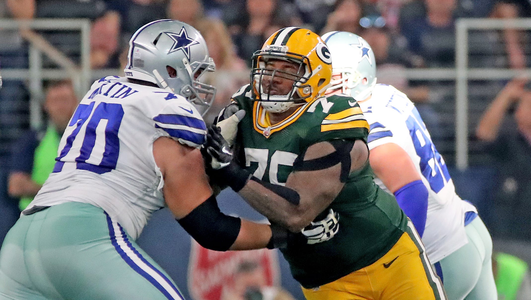 Green Bay Packers defensive end Mike Daniels (76) drives against Dallas Cowboys offensive guard Zack Martin (70) on Oct. 8, 2017, at AT&T Stadium in Arlington, Tx.