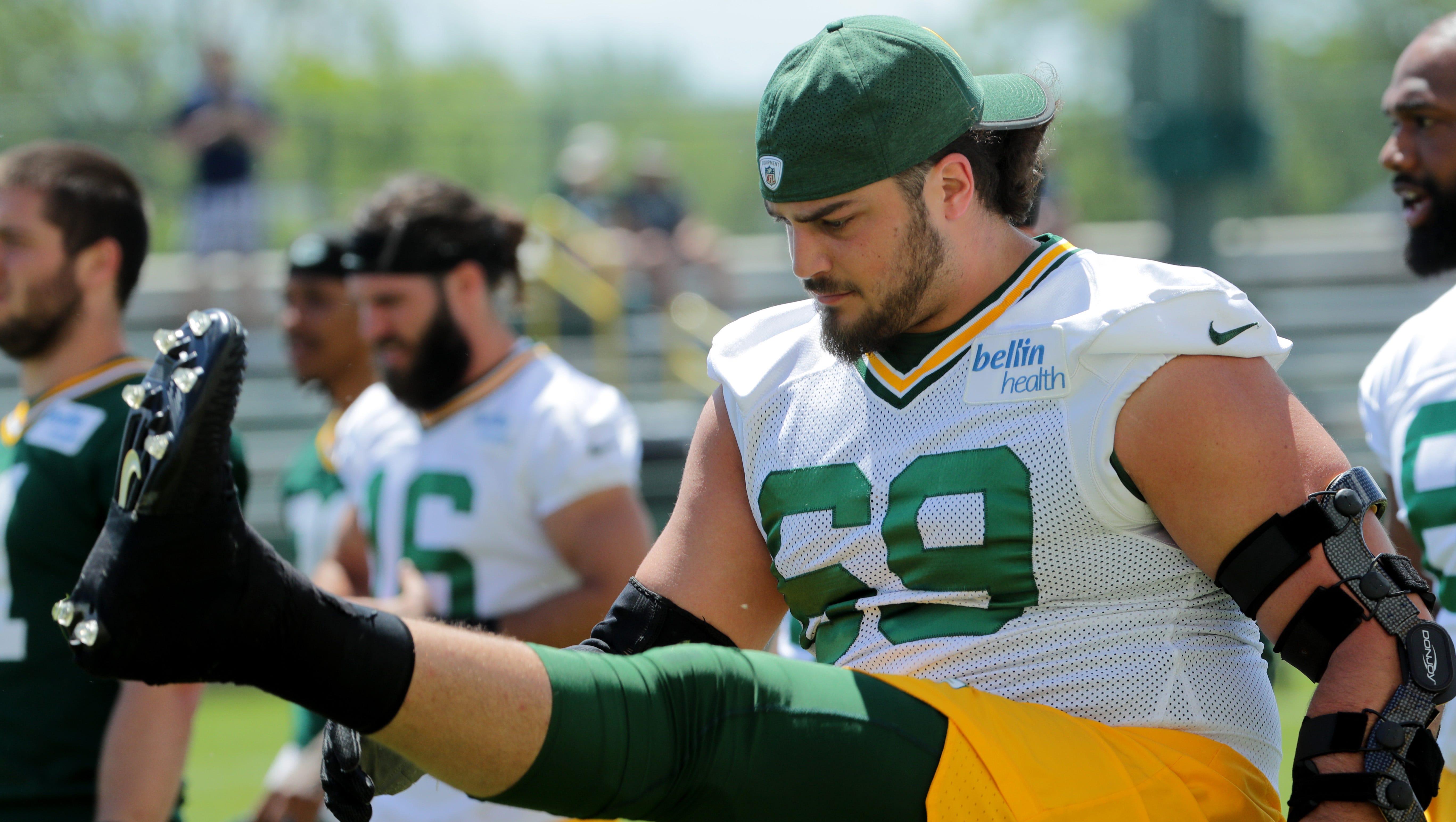 Green Bay Packers left tackle David Bakhtiari (69) stretches during organized team activities on June 4, 2018, in Green Bay.