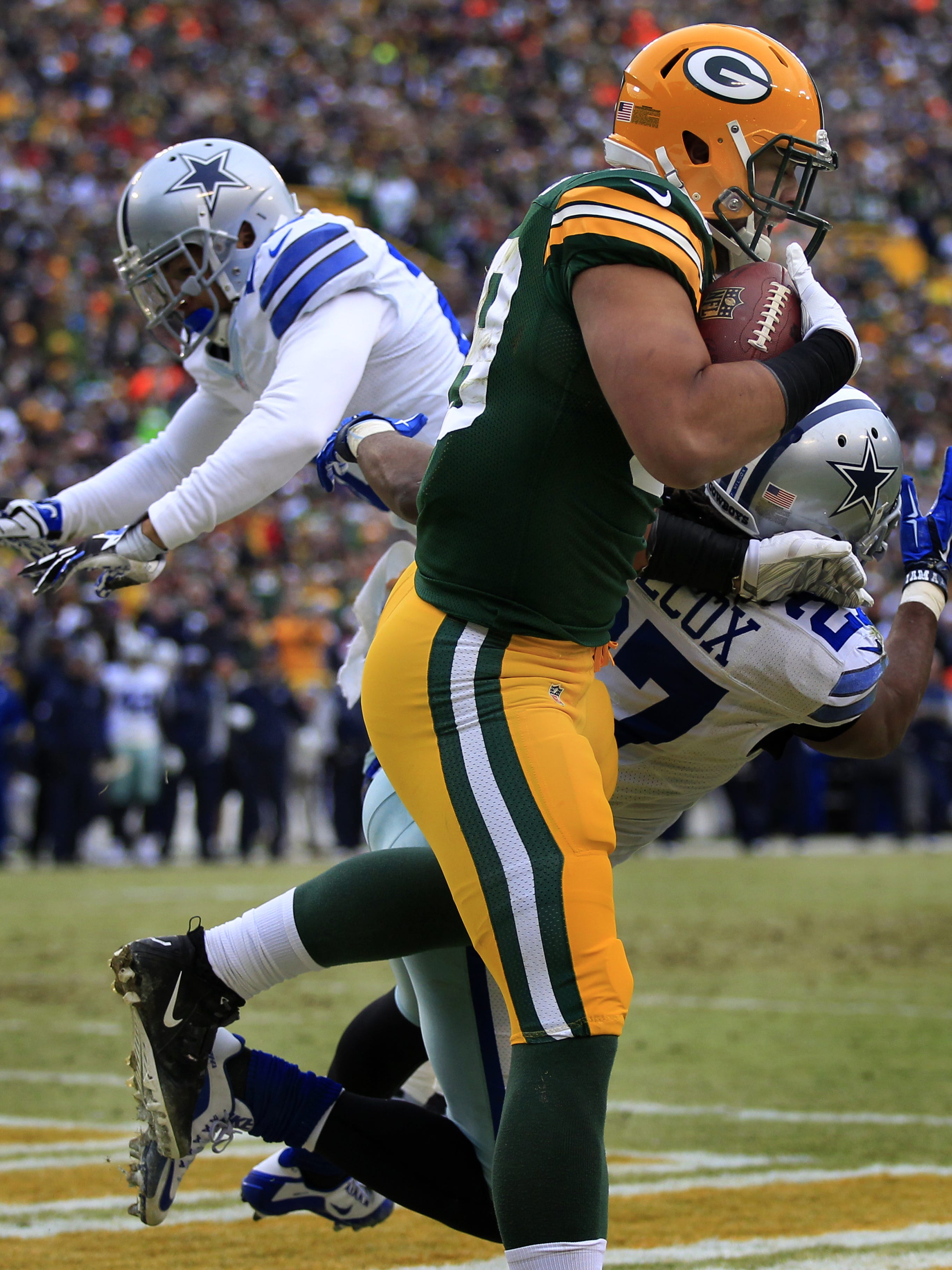 Green Bay Packers tight end Richard Rodgers catches the go-ahead touchdown pass from quarterback Aaron Rodgers in the fourth quarter of Sunday's NFC divisional playoff game against the Dallas Cowboys at Lambeau Field.
