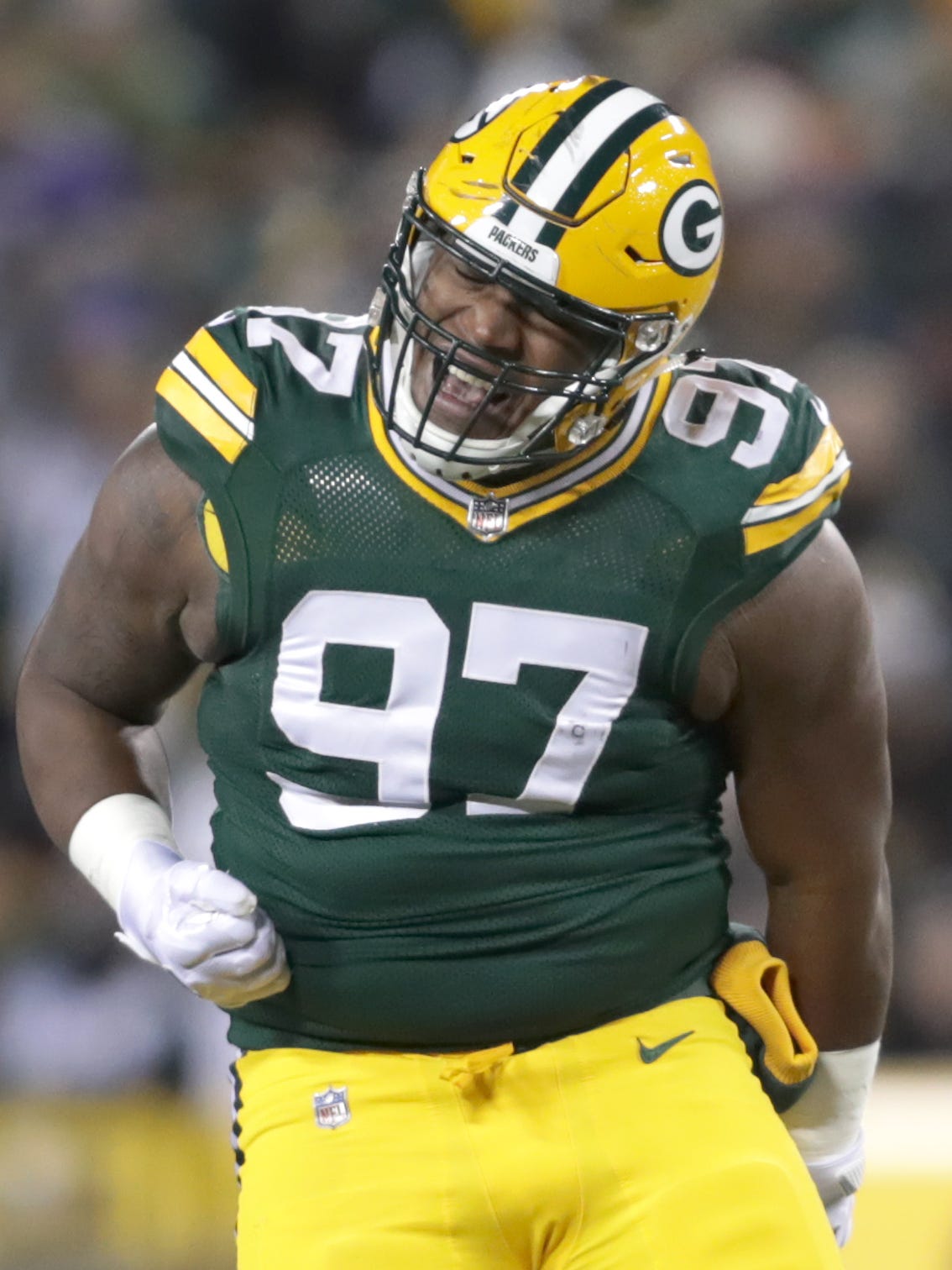 Green Bay Packers nose tackle Kenny Clark reacts to a first quarter sack against the Minnesota Vikings on Saturday, December 23, 2017 at Lambeau Field in Green Bay, Wis..