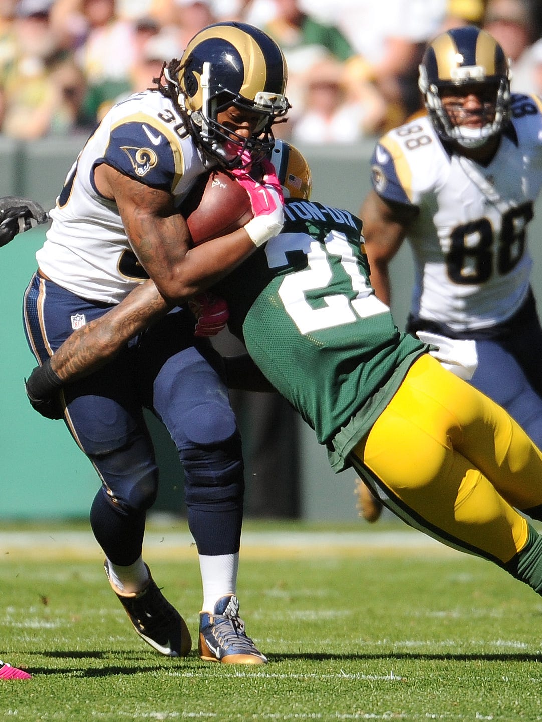 Todd Gurley, shown during an October 2015 game against the Packers, returned to his rookie form last season, finishing with 1,305 yards and 13 touchdowns.