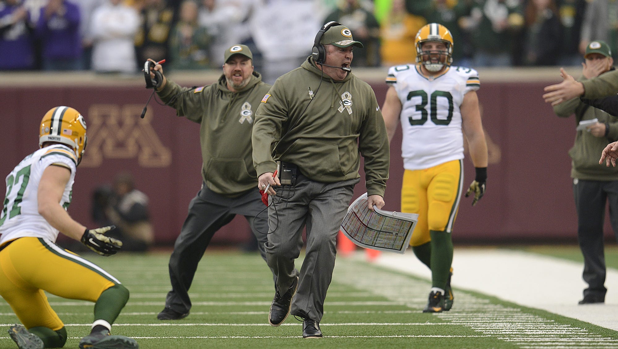 Green Bay Packers coach Mike McCarthy screams with anger after a play against the Minnesota Vikings on Nov. 23, 2014, at TCF Bank Stadium in Minneapolis.