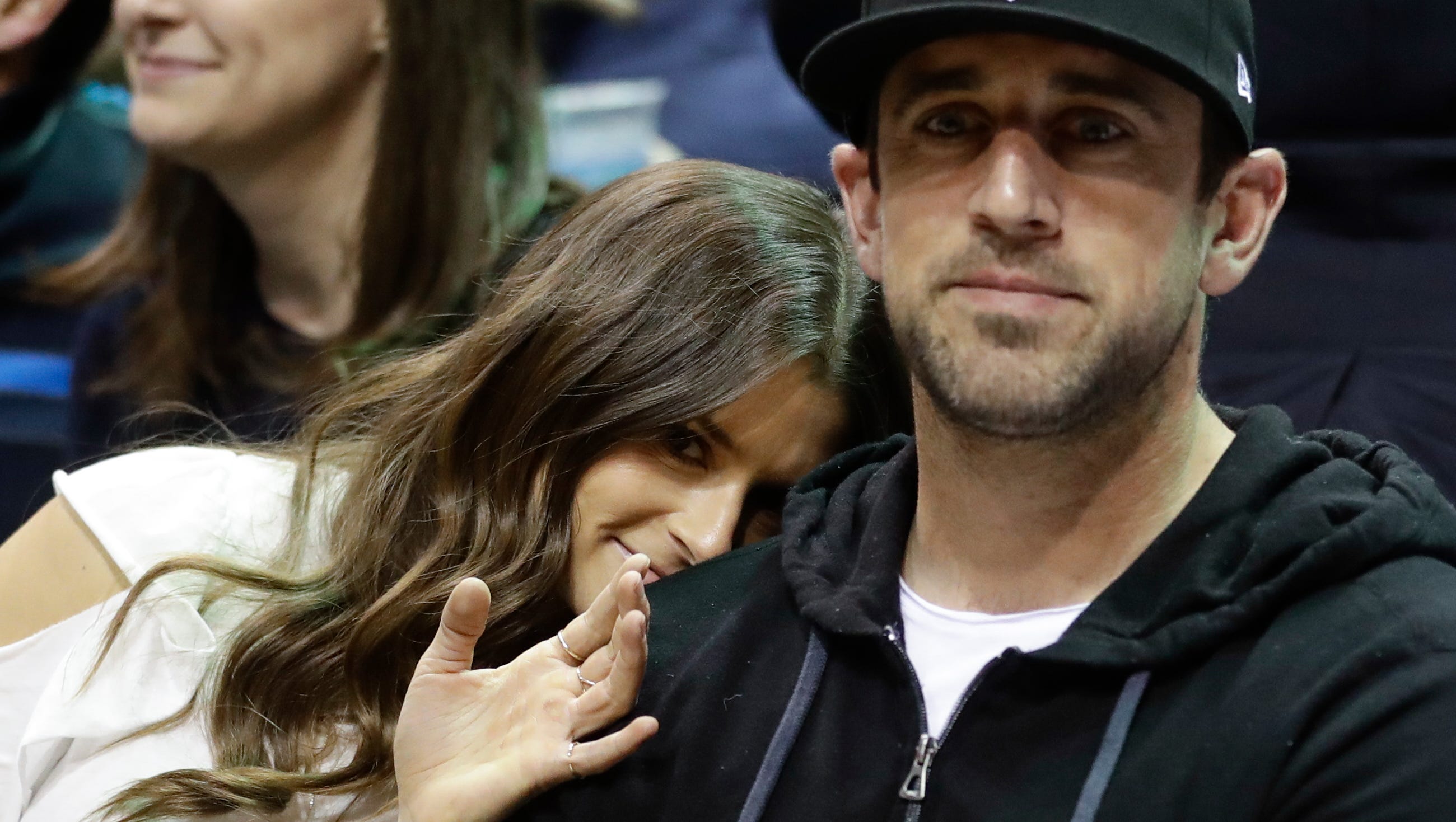 Danica Patrick and Aaron Rodgers watch Game 3 between the Bucks and Celtics on Friday night.