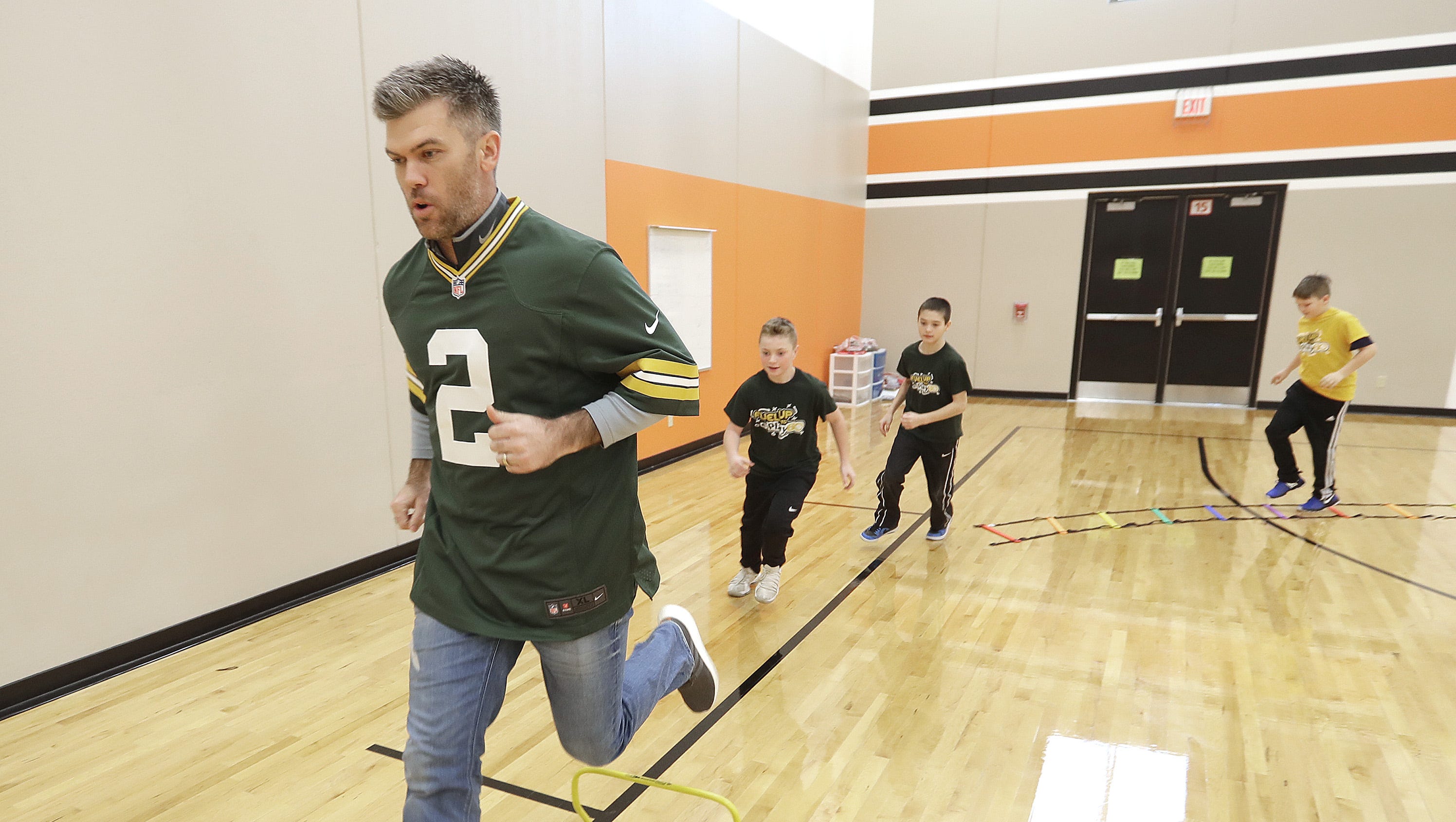 Green Bay Packers kicker Mason Crosby works out with student leaders on Jan. 30, 2018, at Hemlock Creek Elementary School in the town of Lawrence. The visit was a reward for their involvement in Fuel Up to Play 60, an in-school activity and wellness program provided by the Wisconsin Milk Marketing Board and the Green Bay Packers.