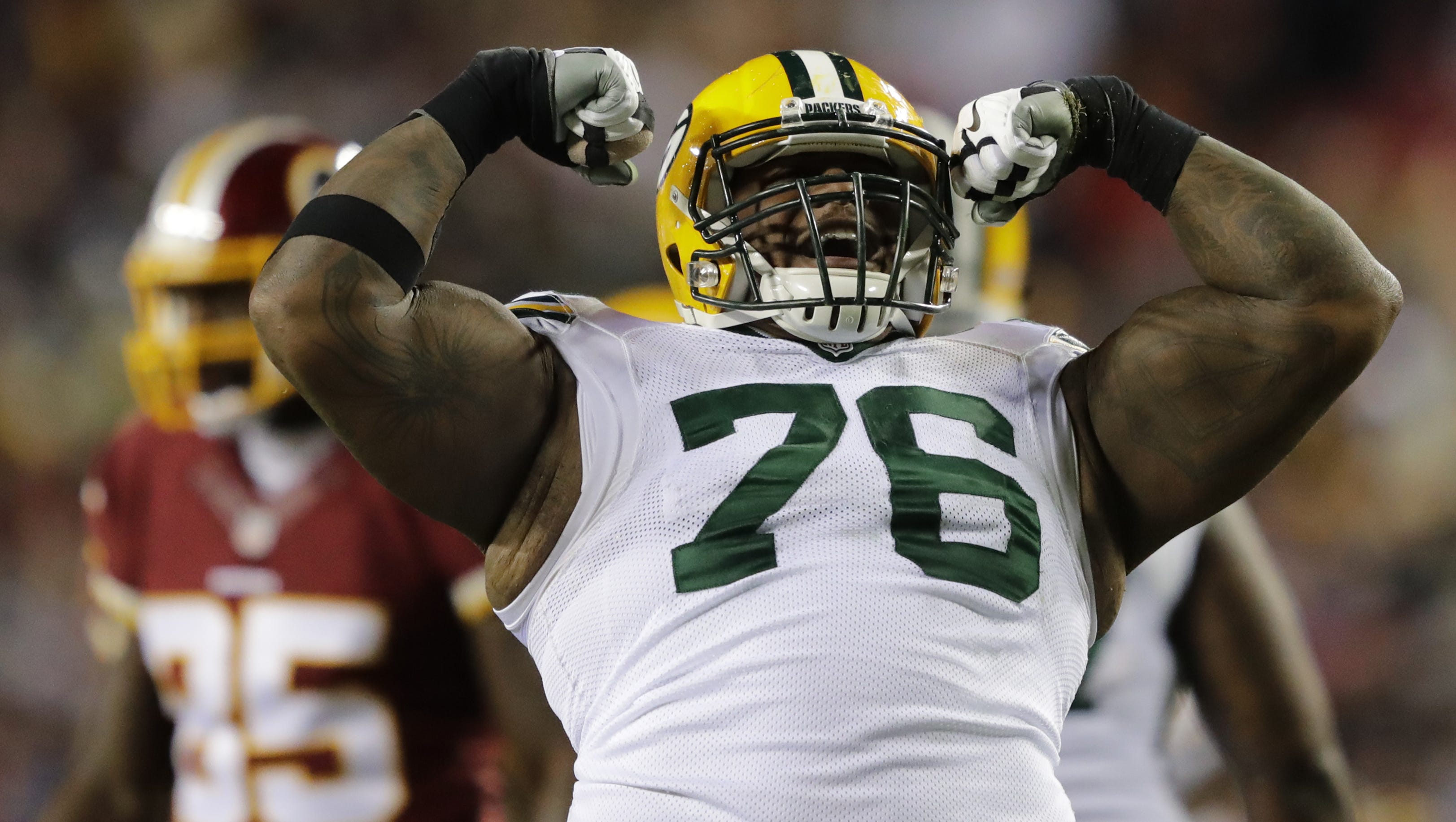 Green Bay defensive end Mike Daniels celebrates making a tackle in the second quarter on Nov. 20, 2016, at FedEx Field.