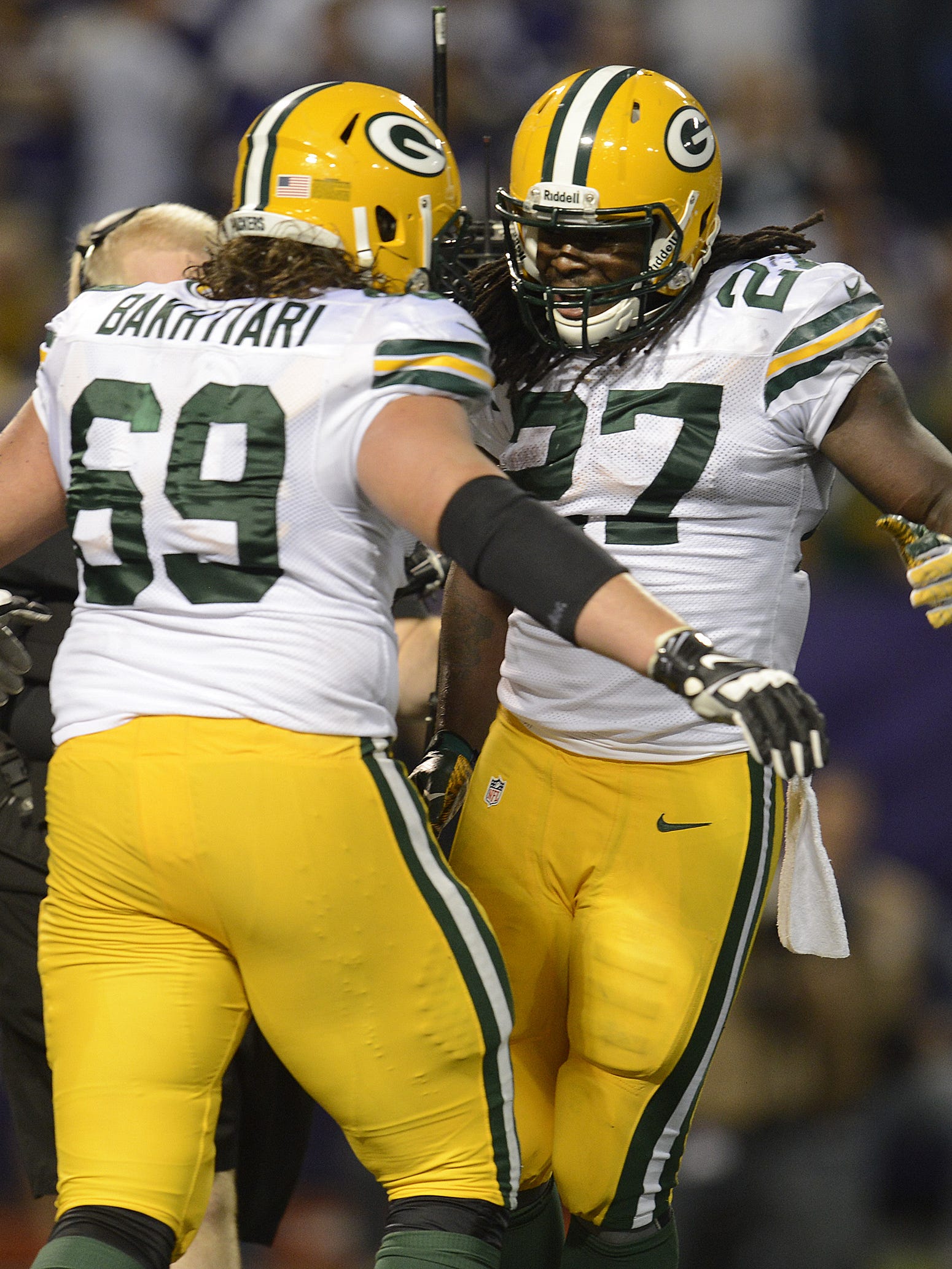 Green Bay Packers running back Eddie Lacy (27) celebrates with David Bakhtiari (69) in the third quarter against the Minnesota Vikings on Oct. 27, 2013, at the Metrodome.