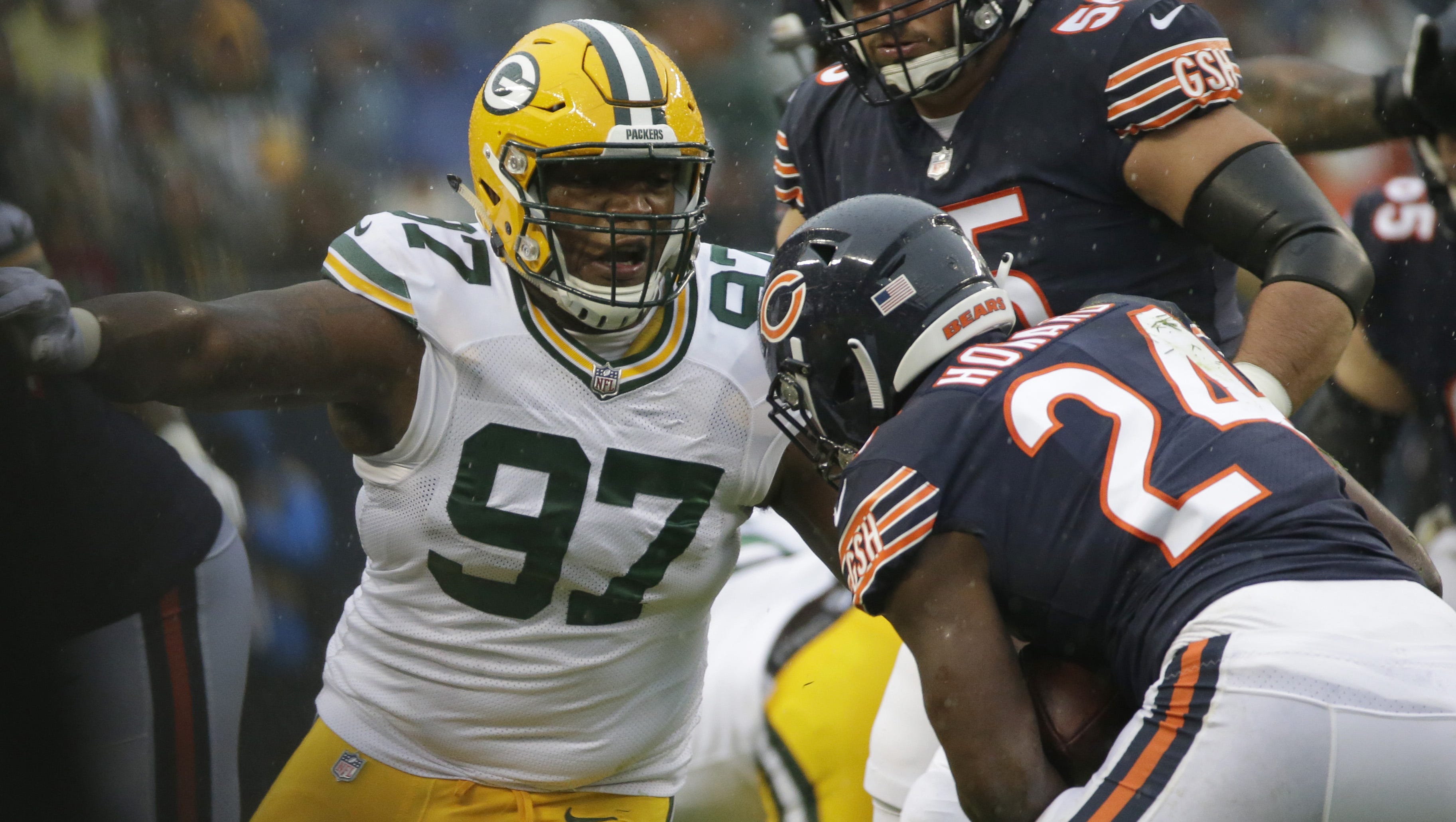 Green Bay Packers nose tackle Kenny Clark (97) misses a tackle on Chicago Bears running back Jordan Howard (24) during the first quarter of their game Sunday, November 12, 2017 at Soldier Field in Chicago, Ill. The Green Bay Packers beat the Chicago Bears 23-16.

MARK HOFFMAN/MILWAUKEE JOURNAL SENTINEL