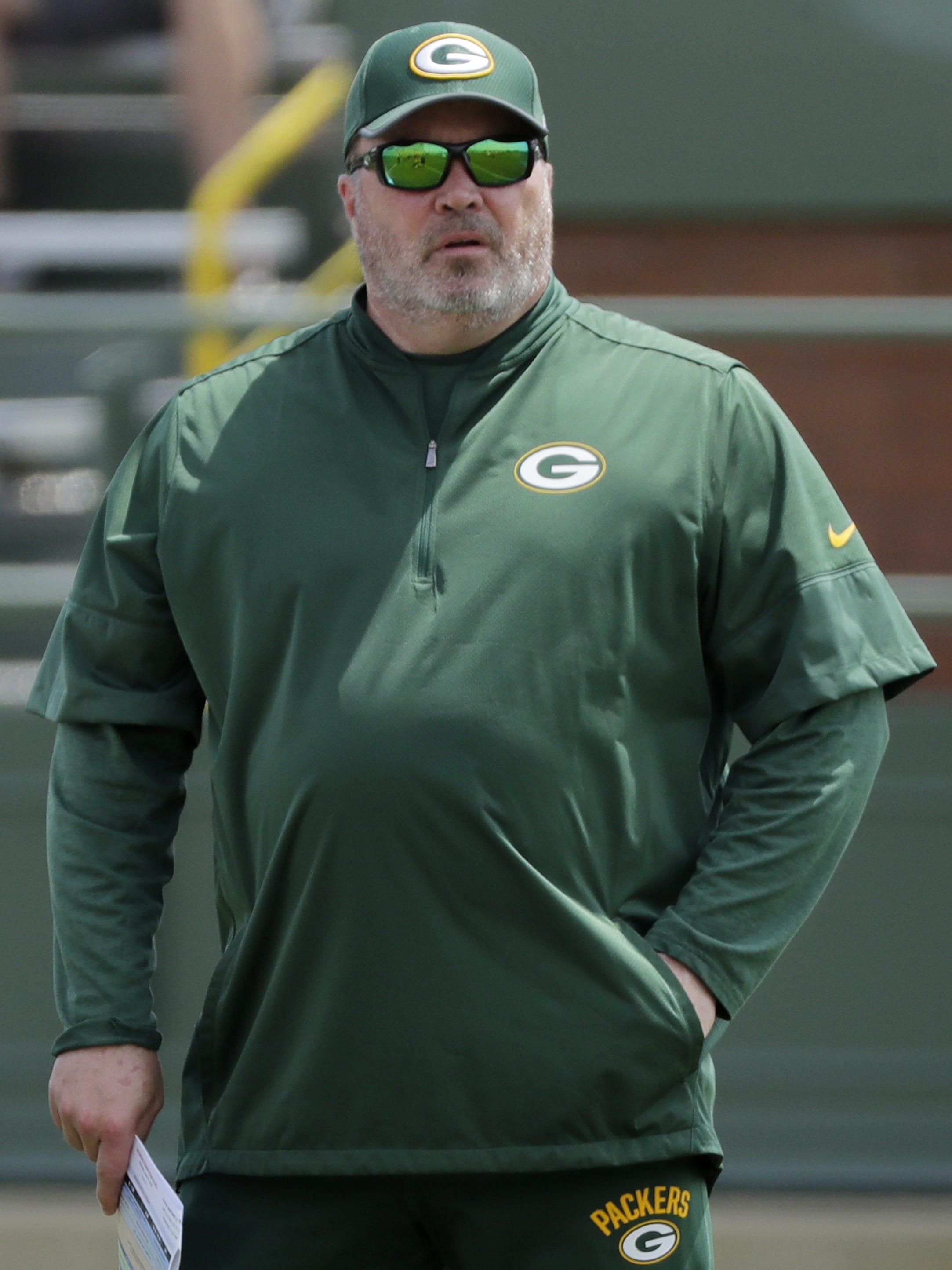 Green Bay Packers coach Mike McCarthy watches during minicamp practice on June 14, 2018, at Ray Nitschke Field.