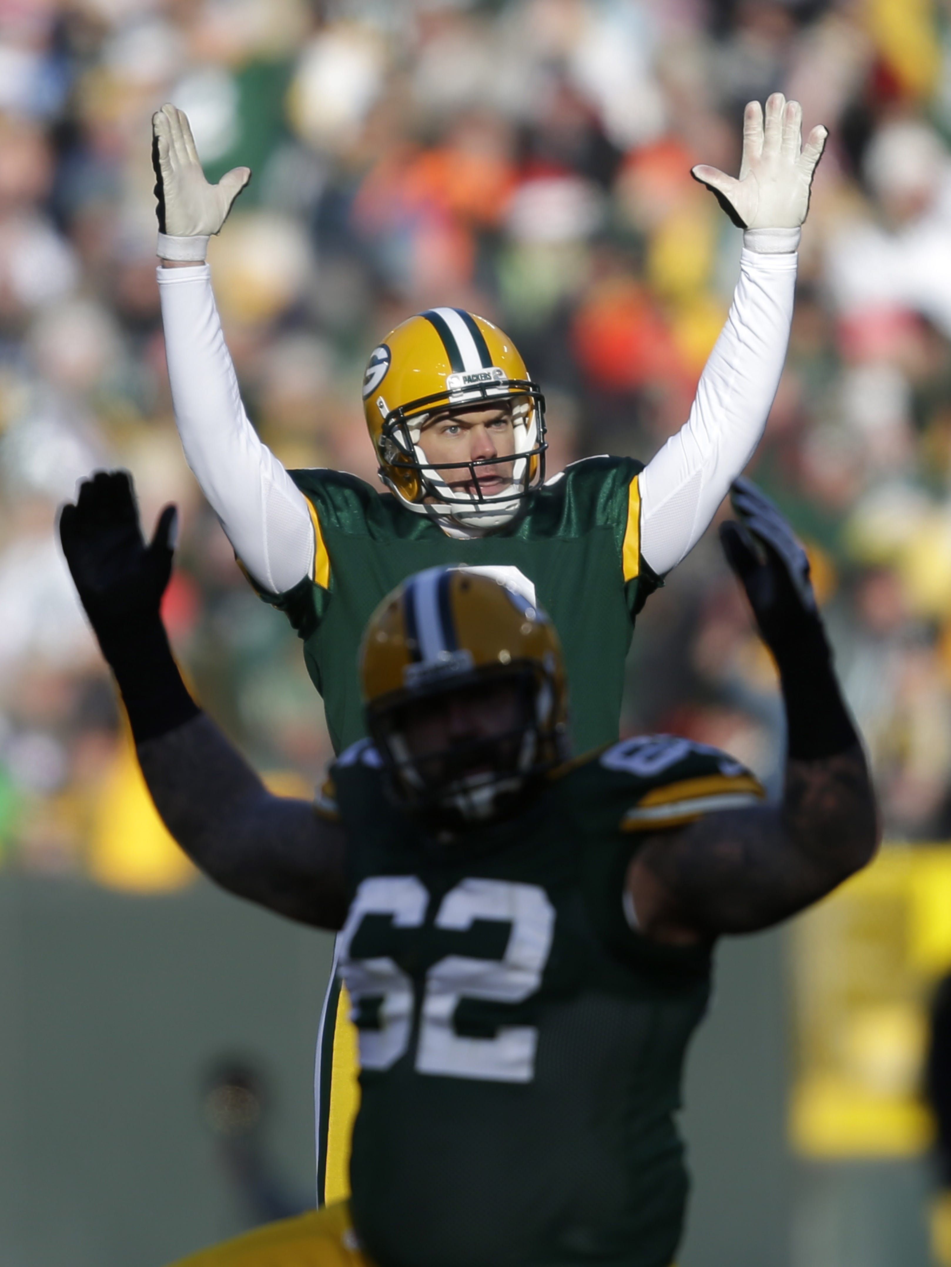 Mason Crosby celebrates making a 47-yard field goal in the second quarter against the Tennessee Titans on Dec. 23, 2012, at Lambeau Field.