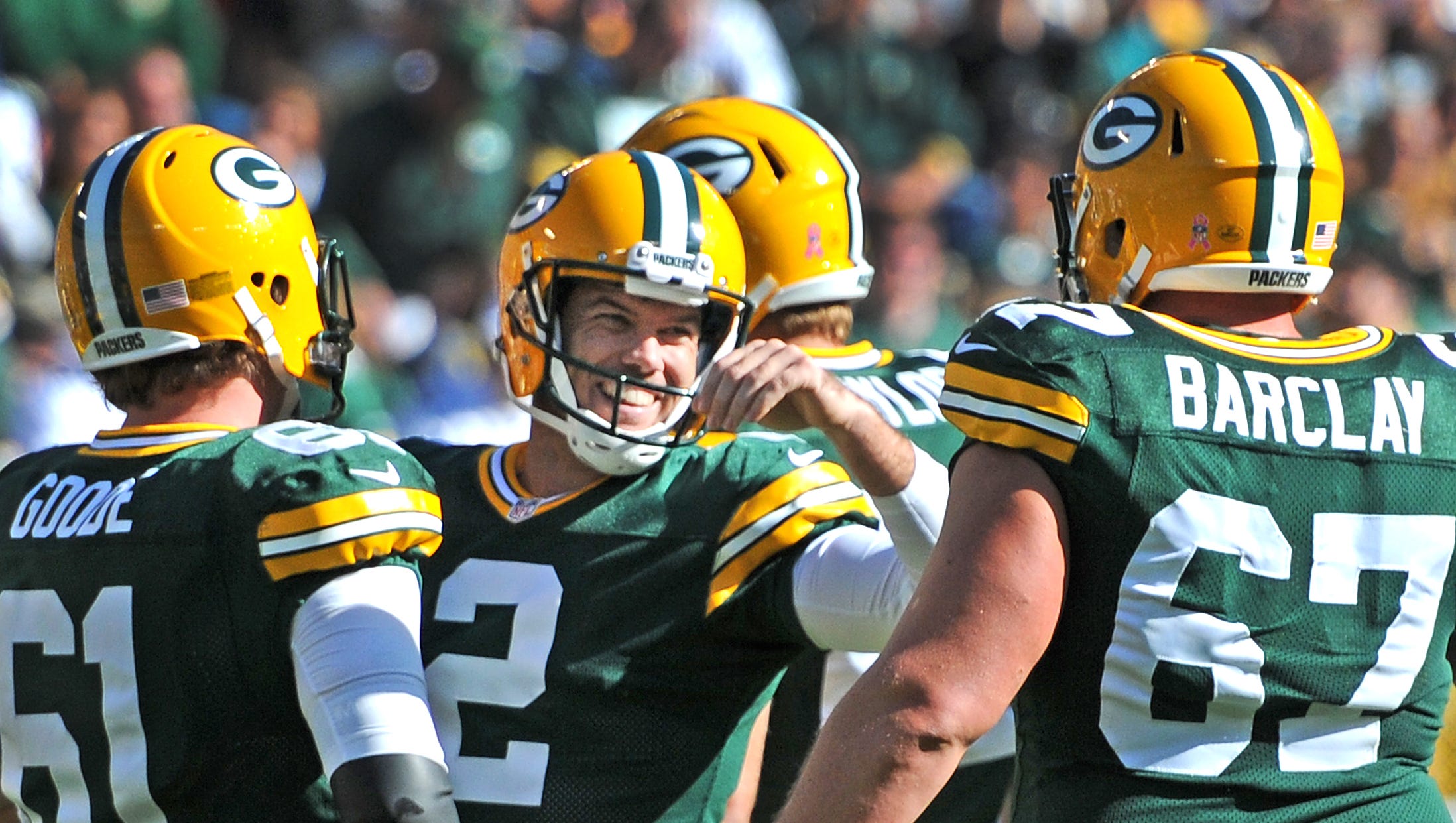 Green Bay Packers kicker Mason Crosby reacts after making one of his two fourth-quarter field goals against the Detroit Lions on Oct. 6, 2013, at Lambeau Field. He finished 5-for-5 on the day.