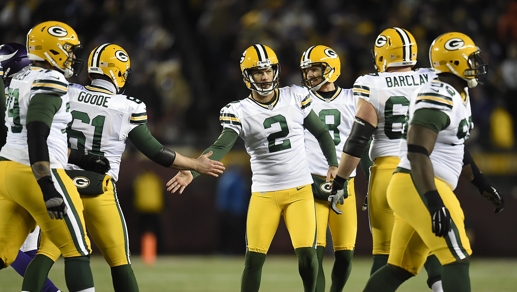 Green Bay Packers kicker Mason Crosby (2) is congratulated by his teammates after Crosby made a field goal against the Minnesota Vikings in the third quarter on Nov. 22, 2015, at TCF Bank Stadium in Minneapolis.