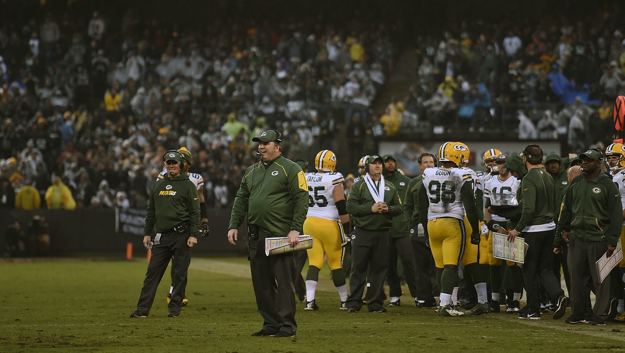 Green Bay Packers coach Mike McCarthy reacts after James Jones was penalized while making a catch in the end zone in the fourth quarter against the Oakland Raiders on Dec. 20, 2015, at the O.co Coliseum in Oakland, Calif.