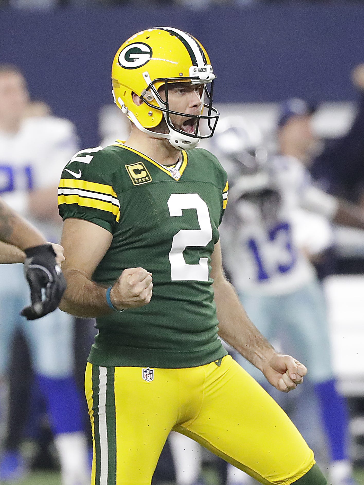 Green Bay Packers kicker Mason Crosby (2) celebrates his long field goal to take the lead late in the fourth quarter against the Dallas Cowboys on Jan. 15, 2017, at AT&T Stadium in Arlington, Texas.