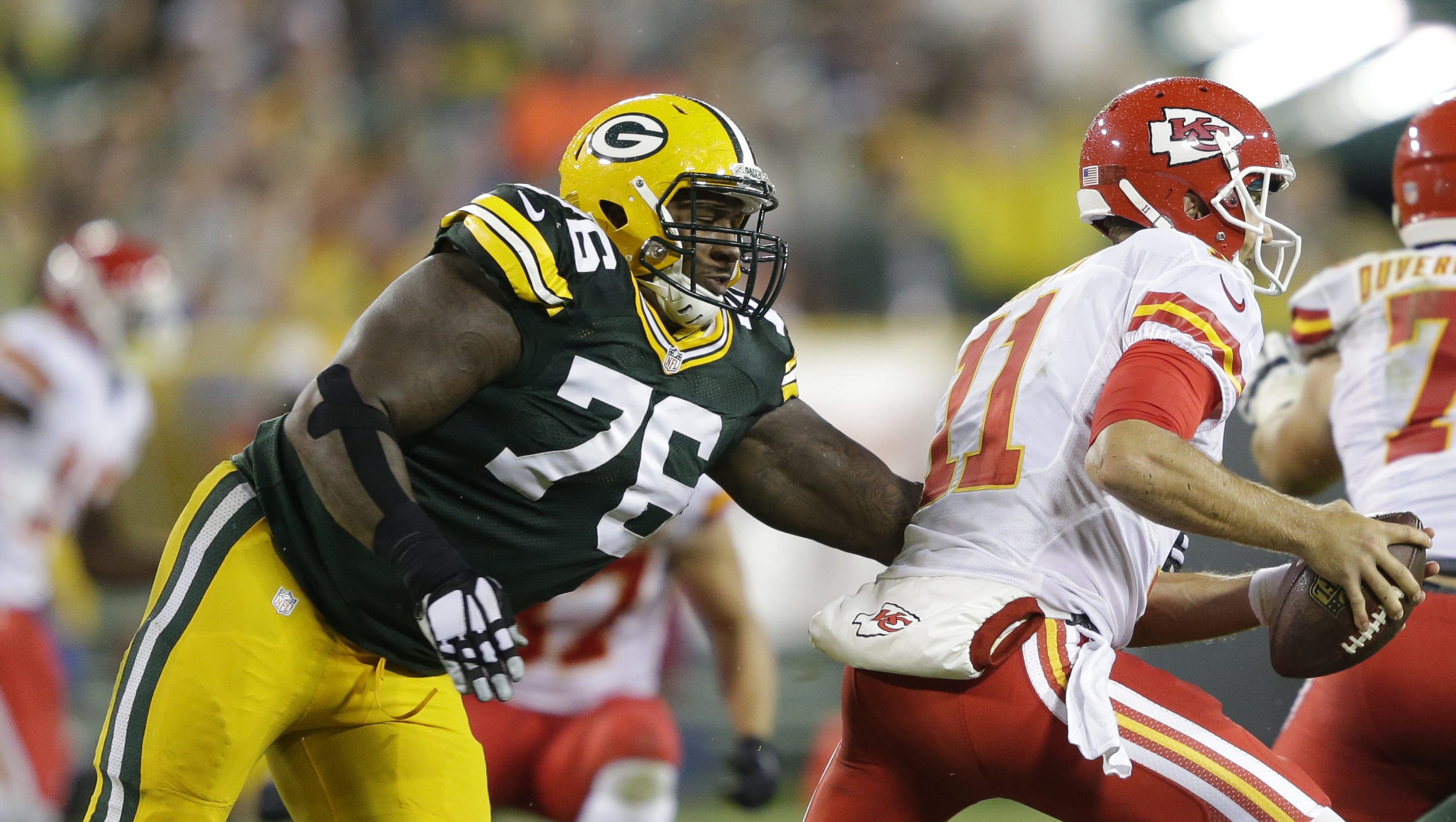 Green Bay Packers defensive end Mike Daniels (76) pressures Kansas City Chiefs quarterback Alex Smith (11) on Sept. 28, 2015, at Lambeau Field.