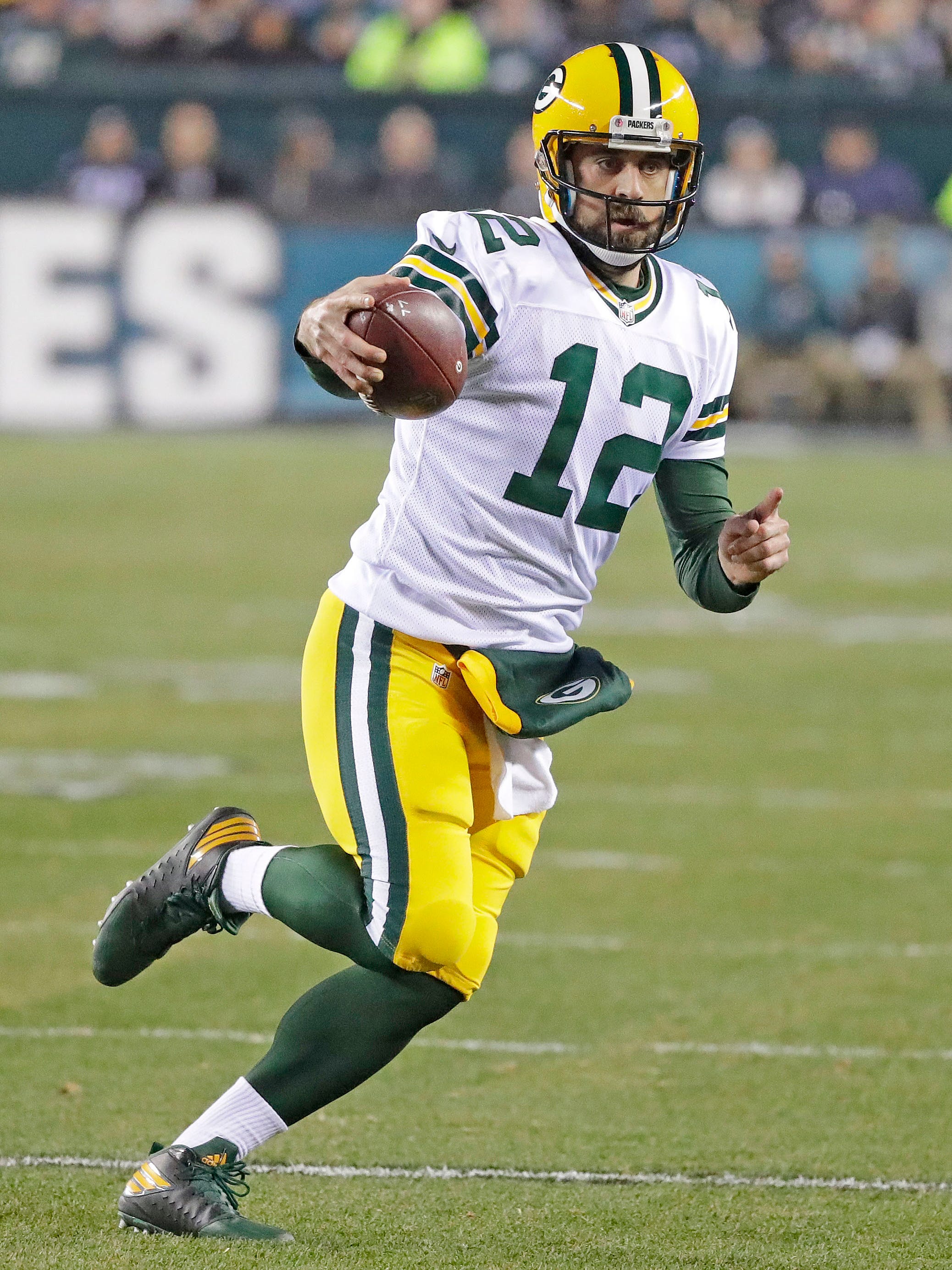 Green Bay Packers quarterback Aaron Rodgers (12) scrambles against the Philadelphia Eagles at Lincoln Financial Field in Philadelphia, PA, November 28, 2016.