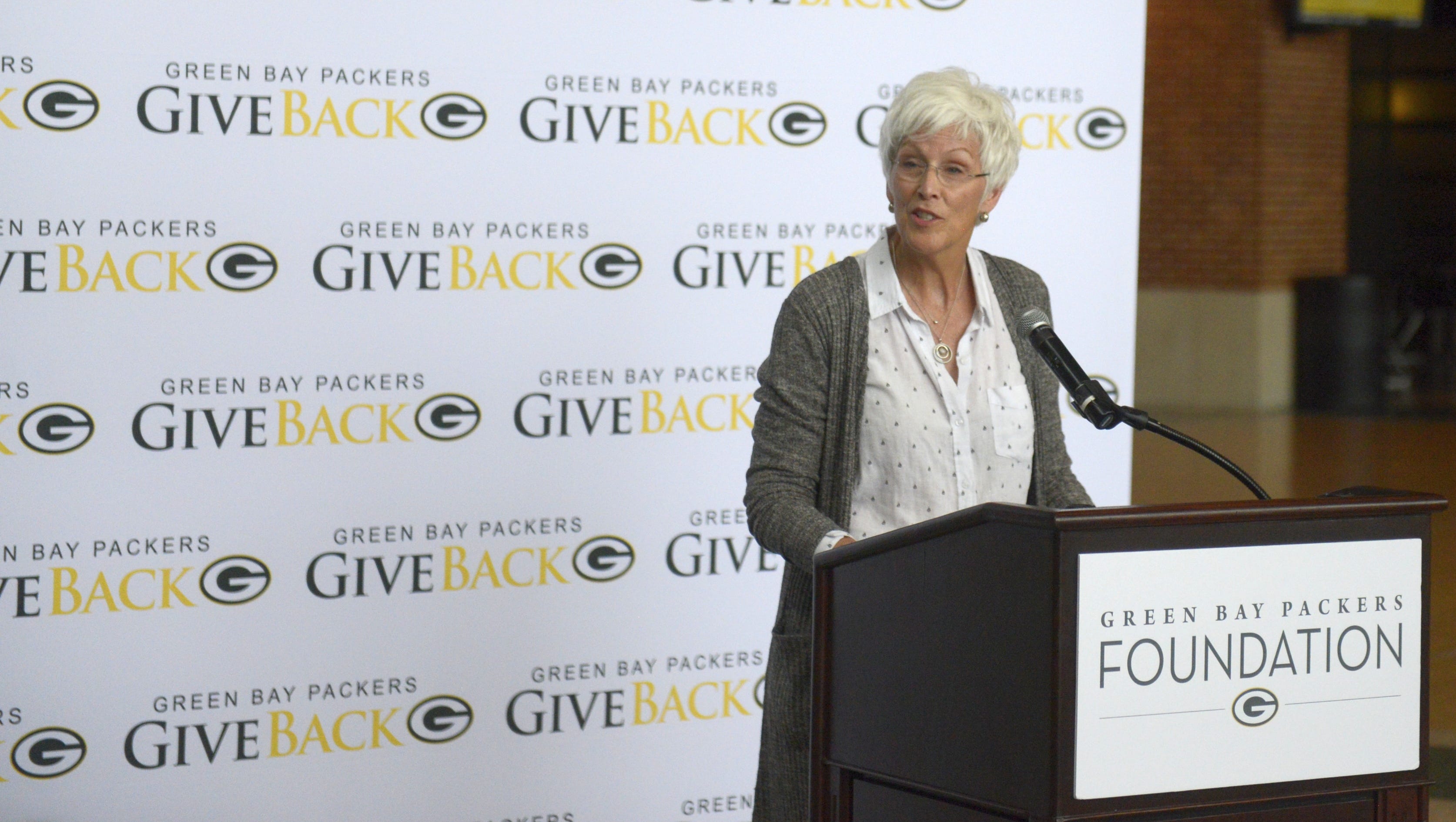 Tracy Arndt of Encompass Early Education and Care Inc. talks on Wednesday, June 20, 2018 about $250,000 impact grant her organization received from the Green Bay Packers Foundation.