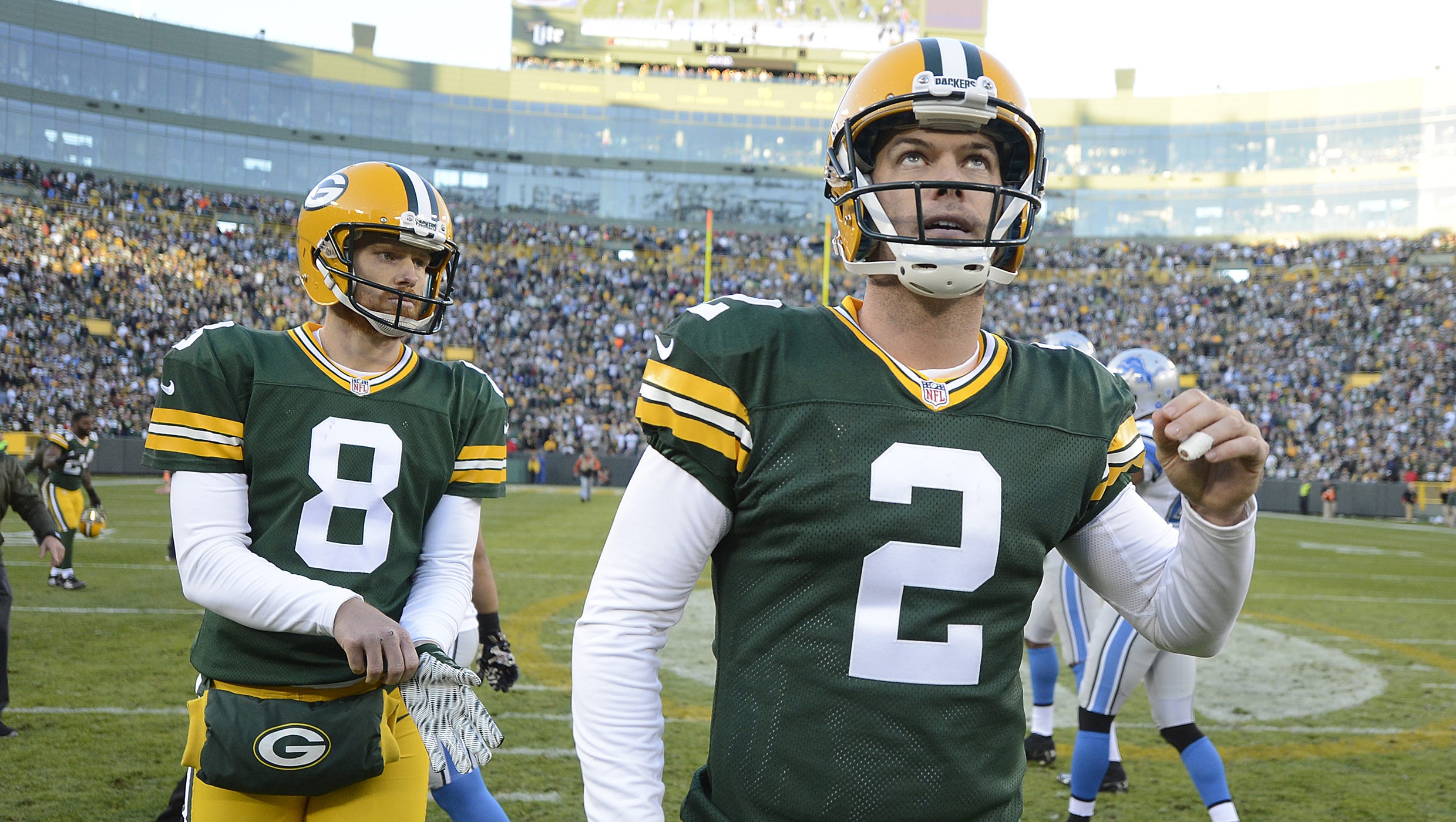 Green Bay Packers kicker Mason Crosby reacts as he watches the replay of his missed field goal attempt against the Detroit Lions on Nov. 15, 2015, at Lambeau Field.