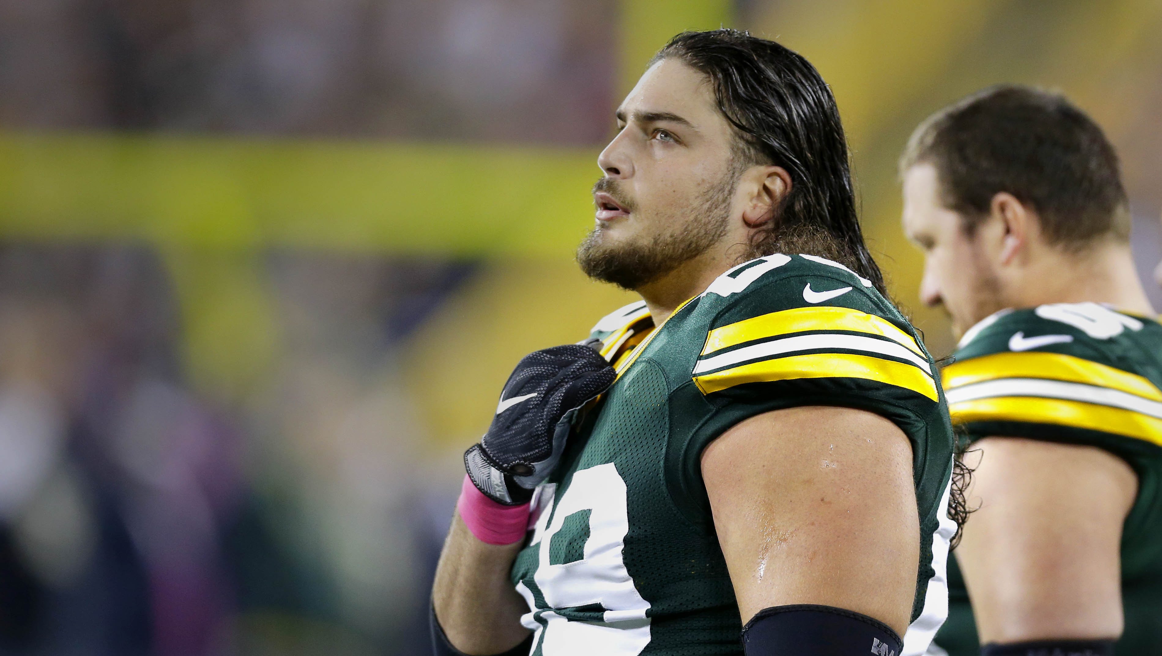 Green Bay Packers left tackle David Bakhtiari (69) pauses during the national anthem before a game against the New York Giants on Oct. 9, 2016, at Lambeau Field in Green Bay.