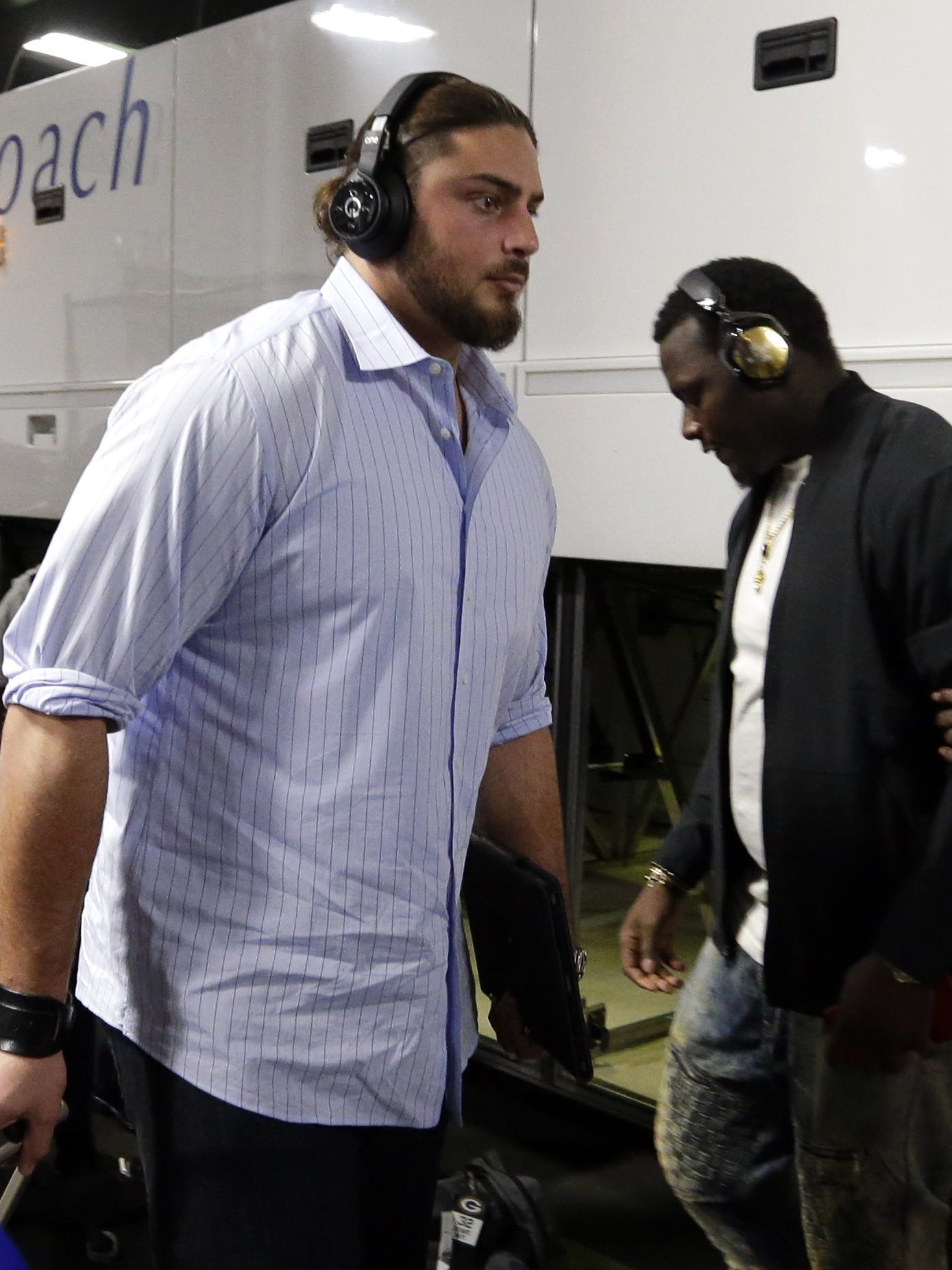 Green Bay Packers left tackle David Bakhtiari (69) gets off the team bus before the game against the Atlanta Falcons on Sept. 17, 2017, at Mercedes Benz Stadium in Atlanta.