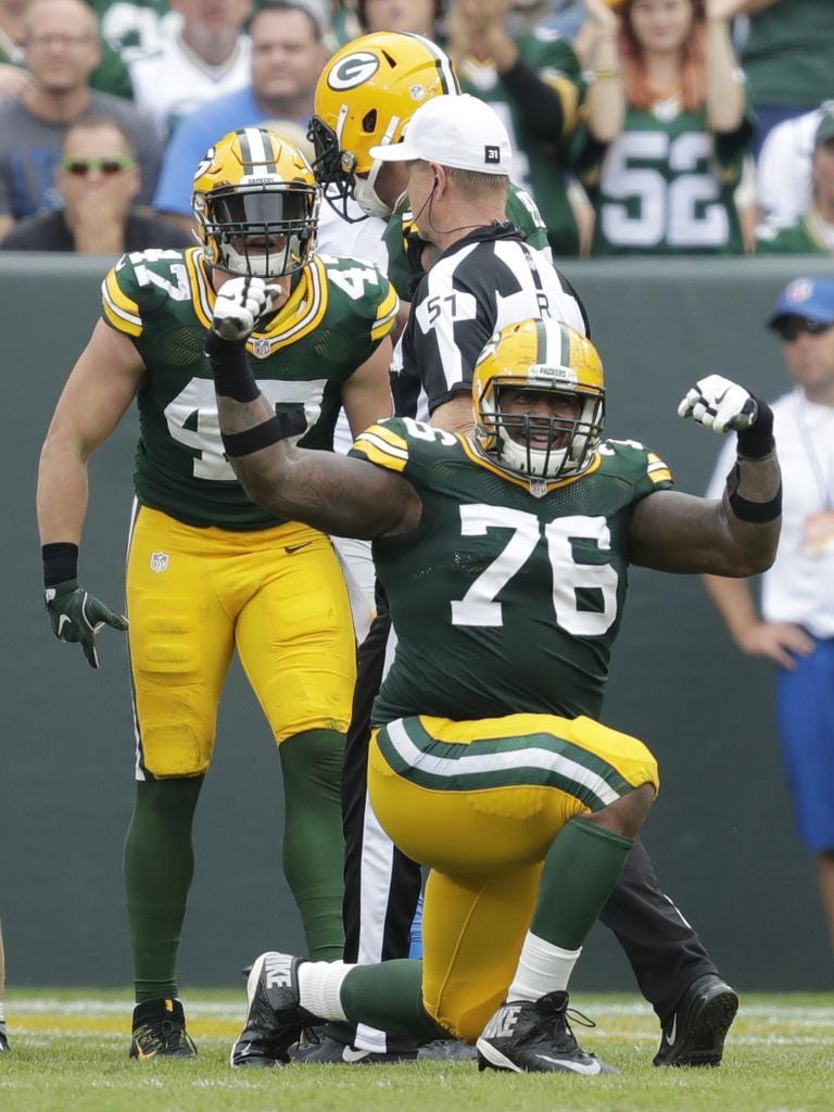 Packers defensive end Mike Daniels celebrates making a stop on third and goal against the Detroit Lions on Sept. 25, 2016, at Lambeau Field.