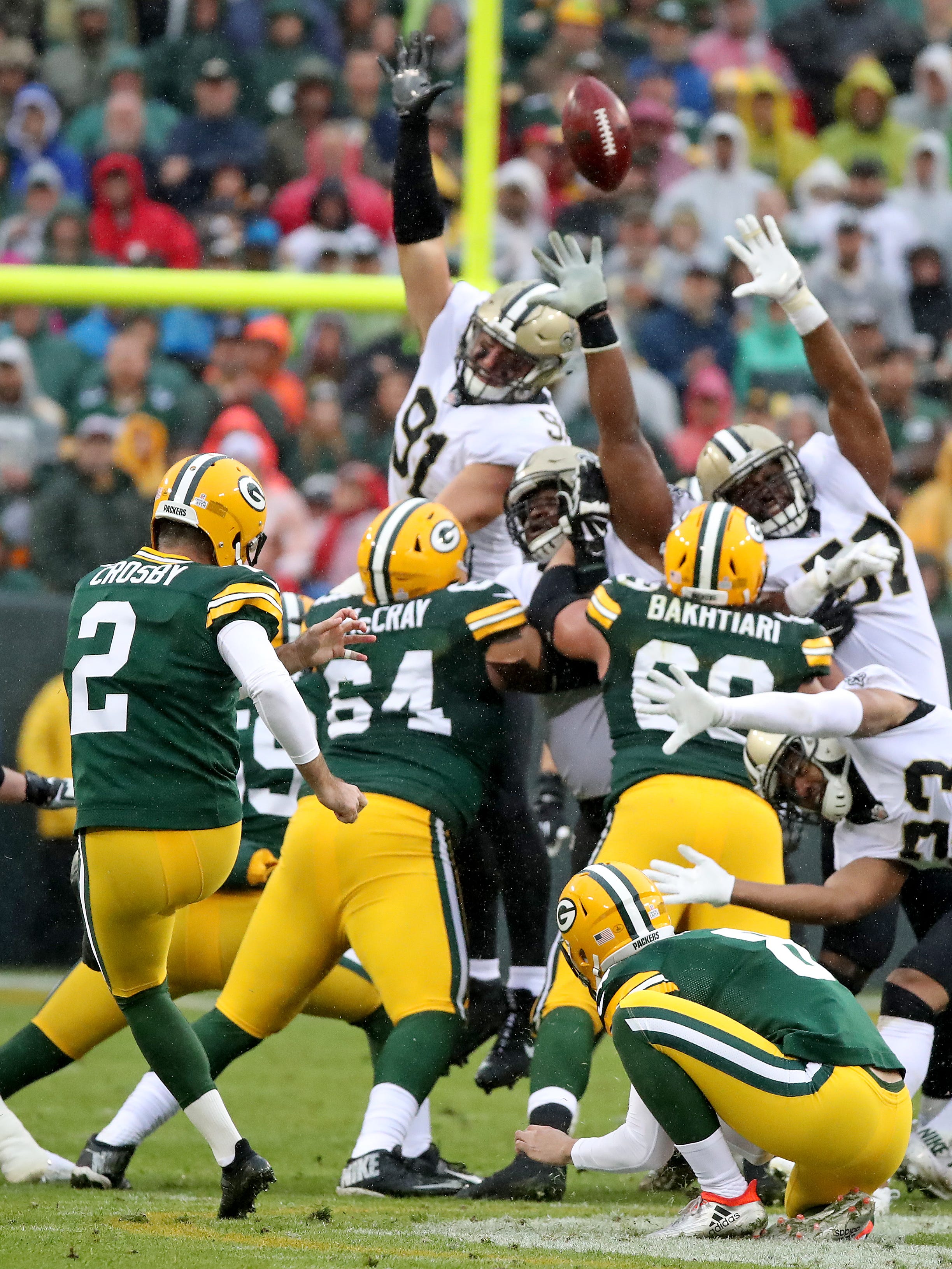 Green Bay Packers kicker Mason Crosby (2) misses on a 59-yard field goal attempt against the New Orleans Saints on Oct. 22, 2017, at Lambeau Field.