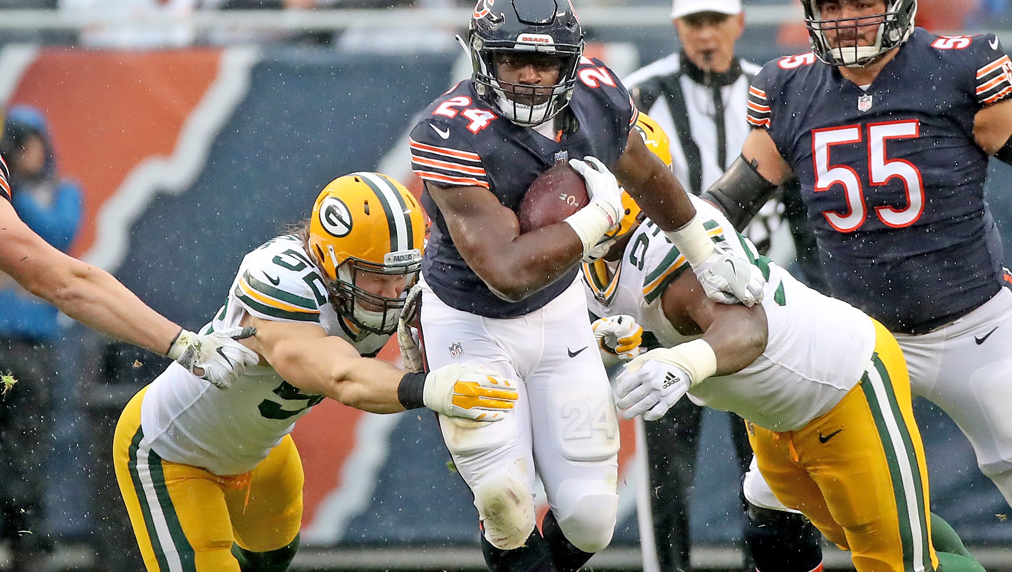 Green Bay Packers outside linebacker Clay Matthews (52) and try to tackle running back Jordan Howard (24) against the Chicago Bears Sunday, November 12, 2017 at Soldier Field in Chicago, Il.