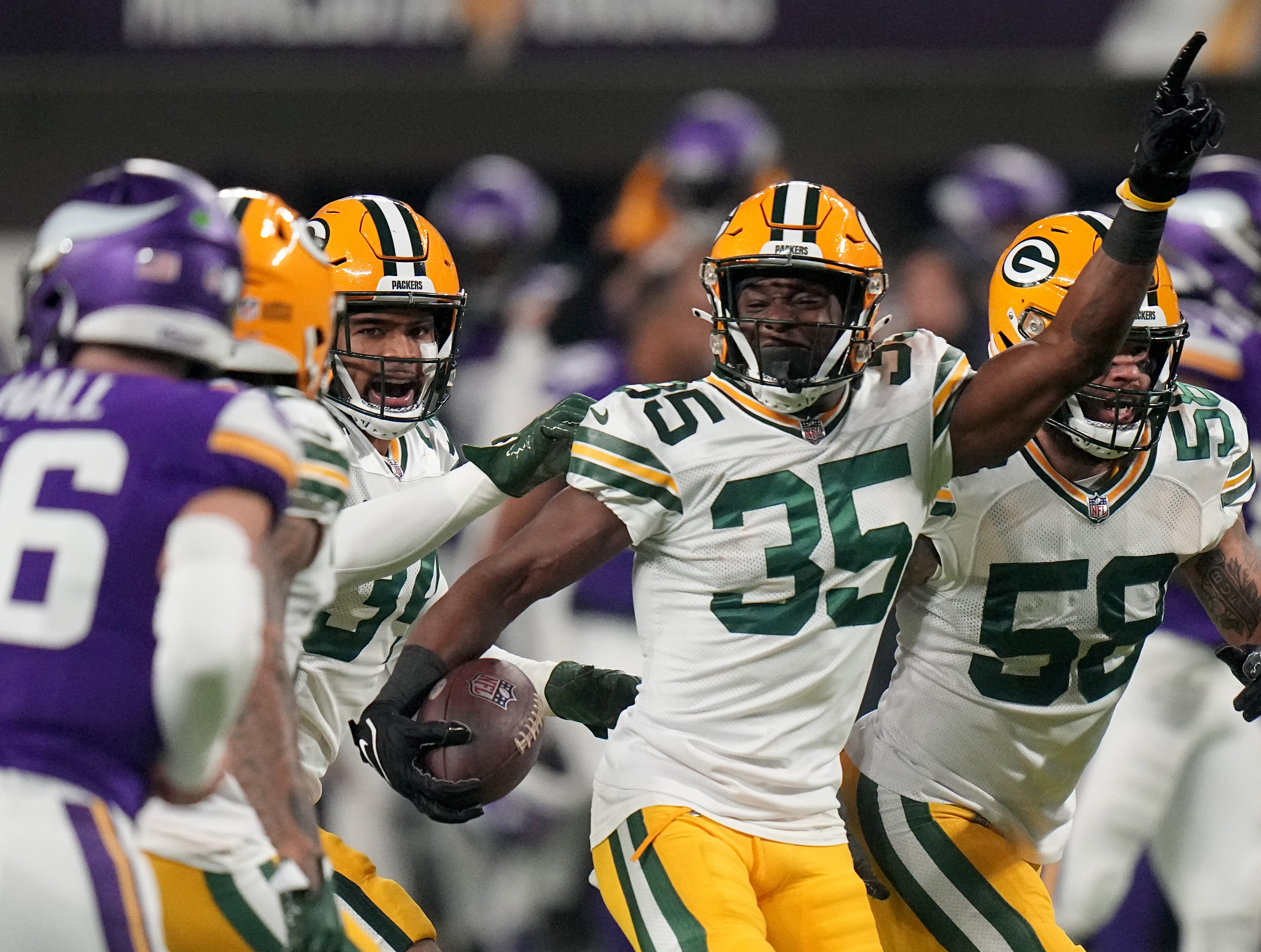 Green Bay Packers cornerback Corey Ballentine (35) celebrates his interception during the first quarter of their game Sunday, December 31, 2023 at U.S. Bank Stadium in Minneapolis, Minnesota. The Green Bay Packers beat the Minnesota Vikings 33-10.