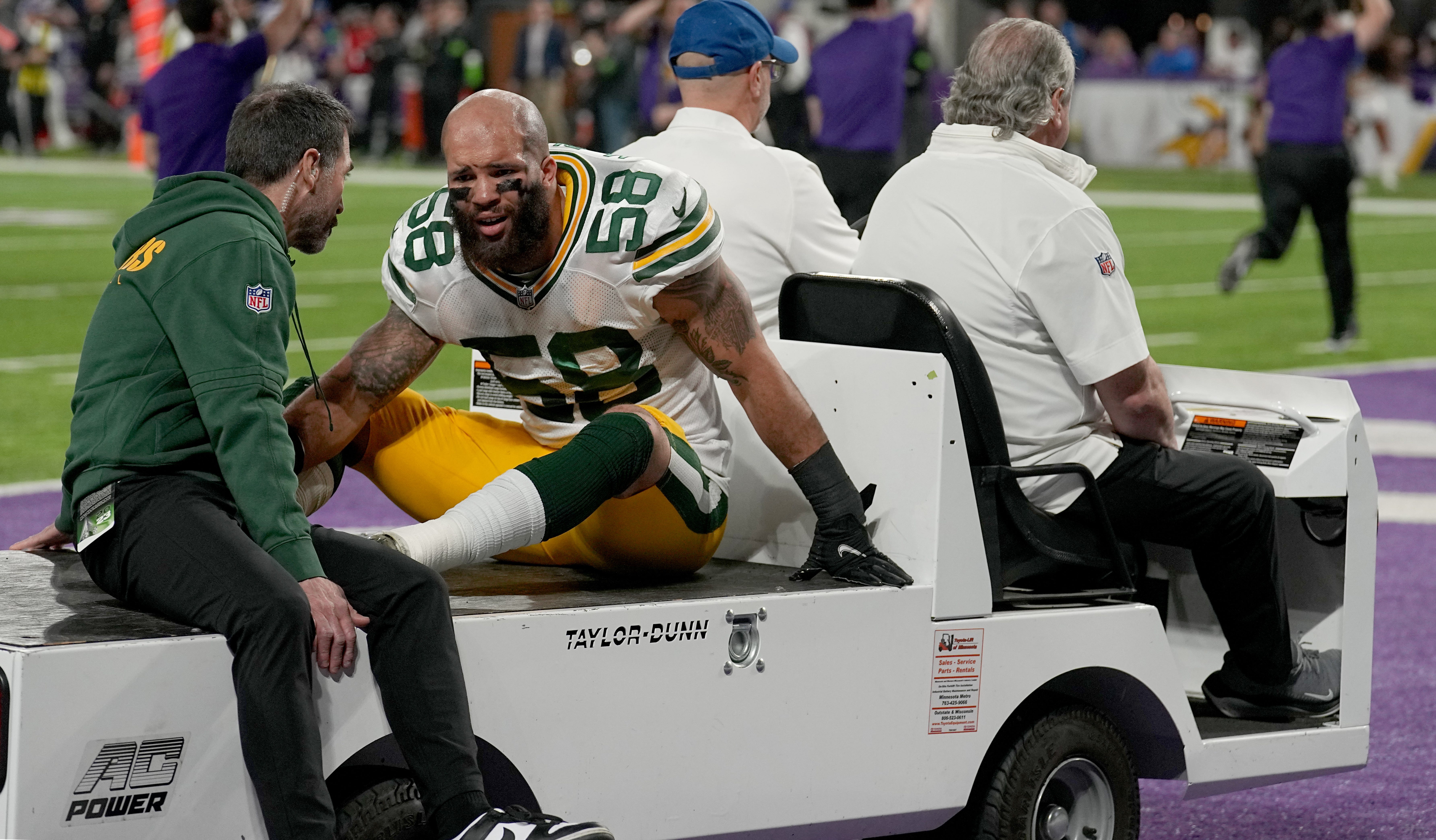 Green Bay Packers linebacker Isaiah McDuffie (58) is carted off the field after a possible concussion during the second quarter of their game Sunday, December 31, 2023 at U.S. Bank Stadium in Minneapolis, Minnesota. The Green Bay Packers beat the Minnesota Vikings 33-10.