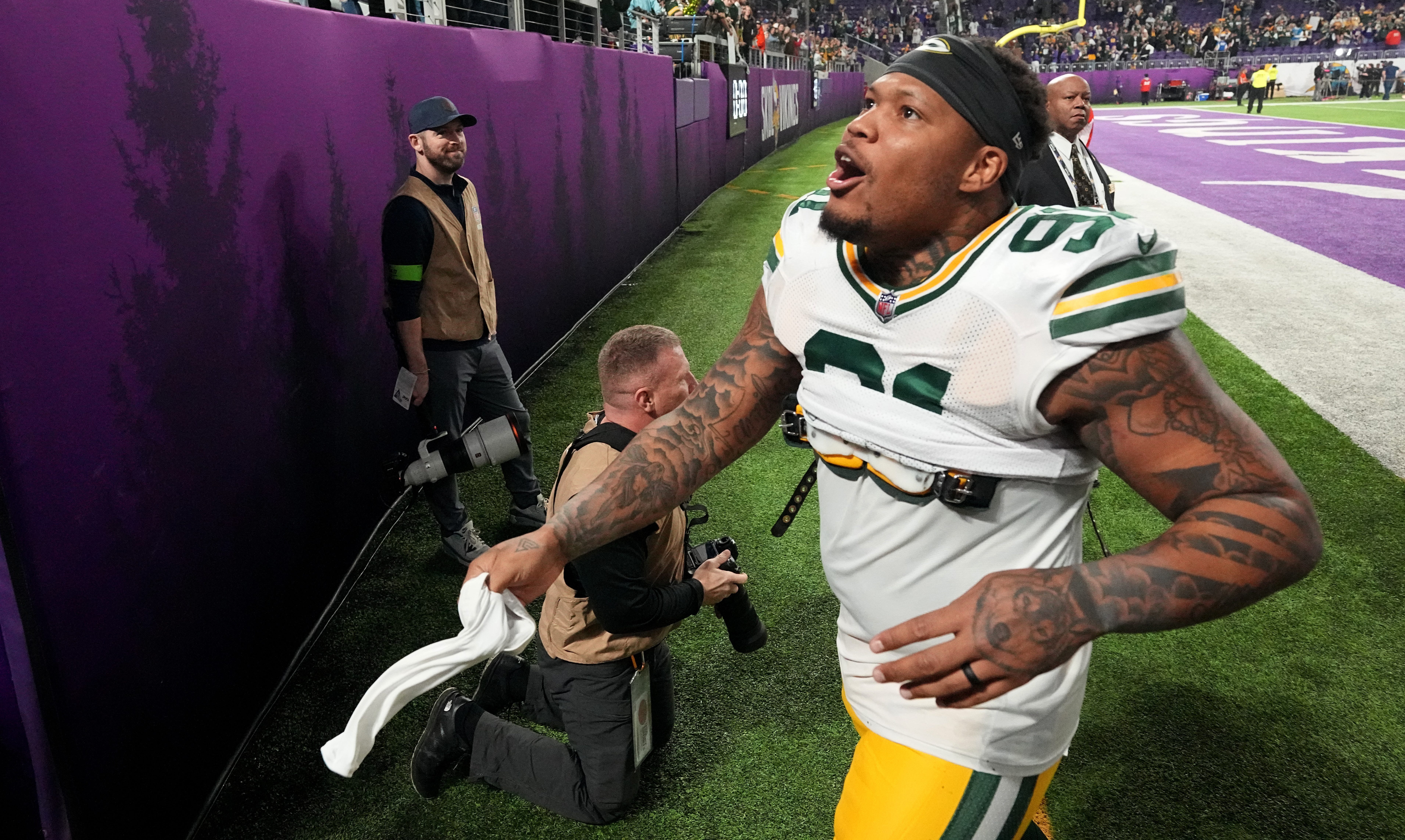 Green Bay Packers linebacker Preston Smith (91) celebrates his team’s win after their game Sunday, December 31, 2023 at U.S. Bank Stadium in Minneapolis, Minnesota. The Green Bay Packers beat the Minnesota Vikings 33-10.