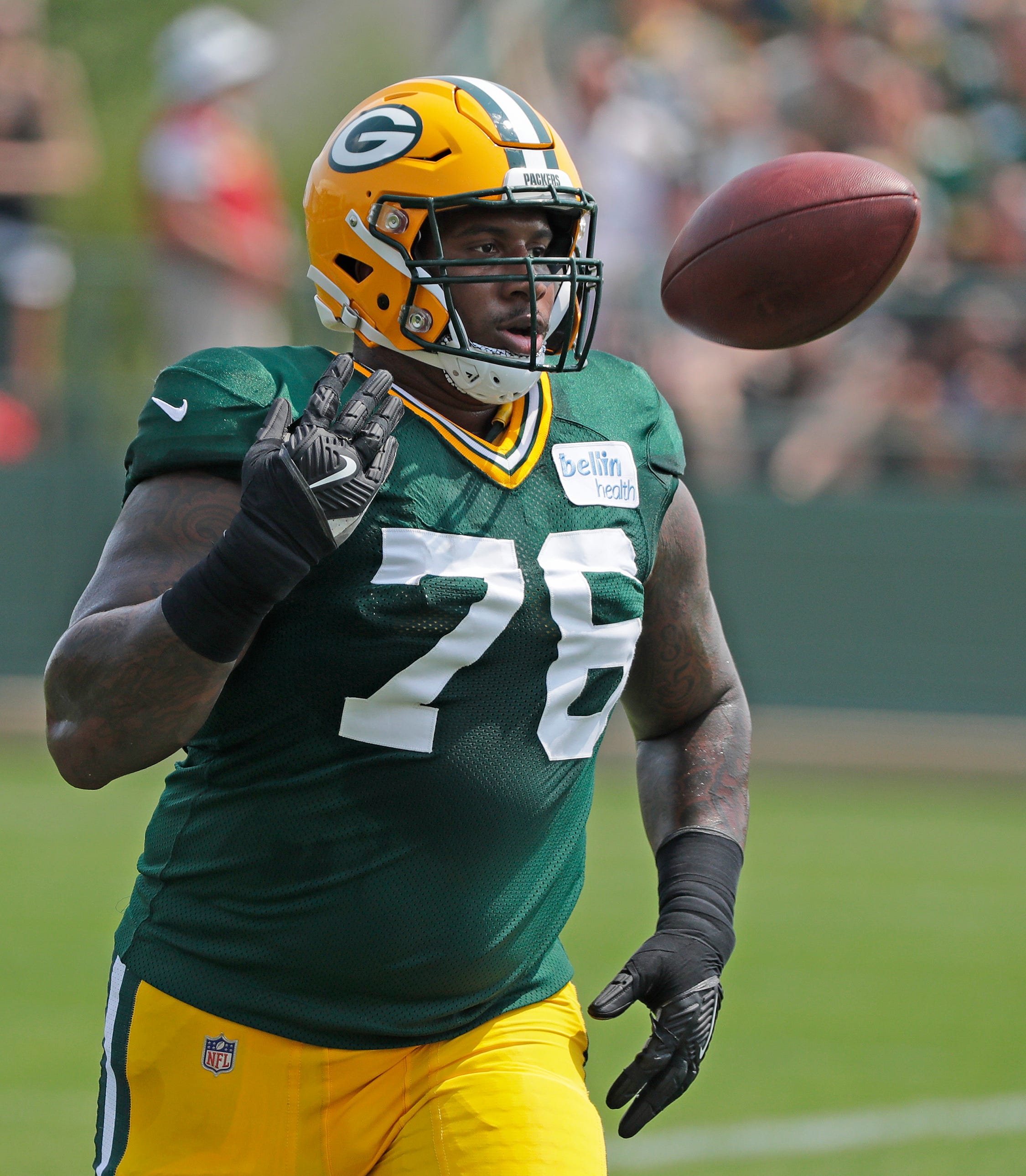 Green Bay Packers defensive tackle Mike Daniels (76) runs through ball drills during training camp practice at Ray Nitschke Field on Sunday, August 12, 2018 in Ashwaubenon, Wis. 
Adam Wesley/USA TODAY NETWORK-Wisconsin