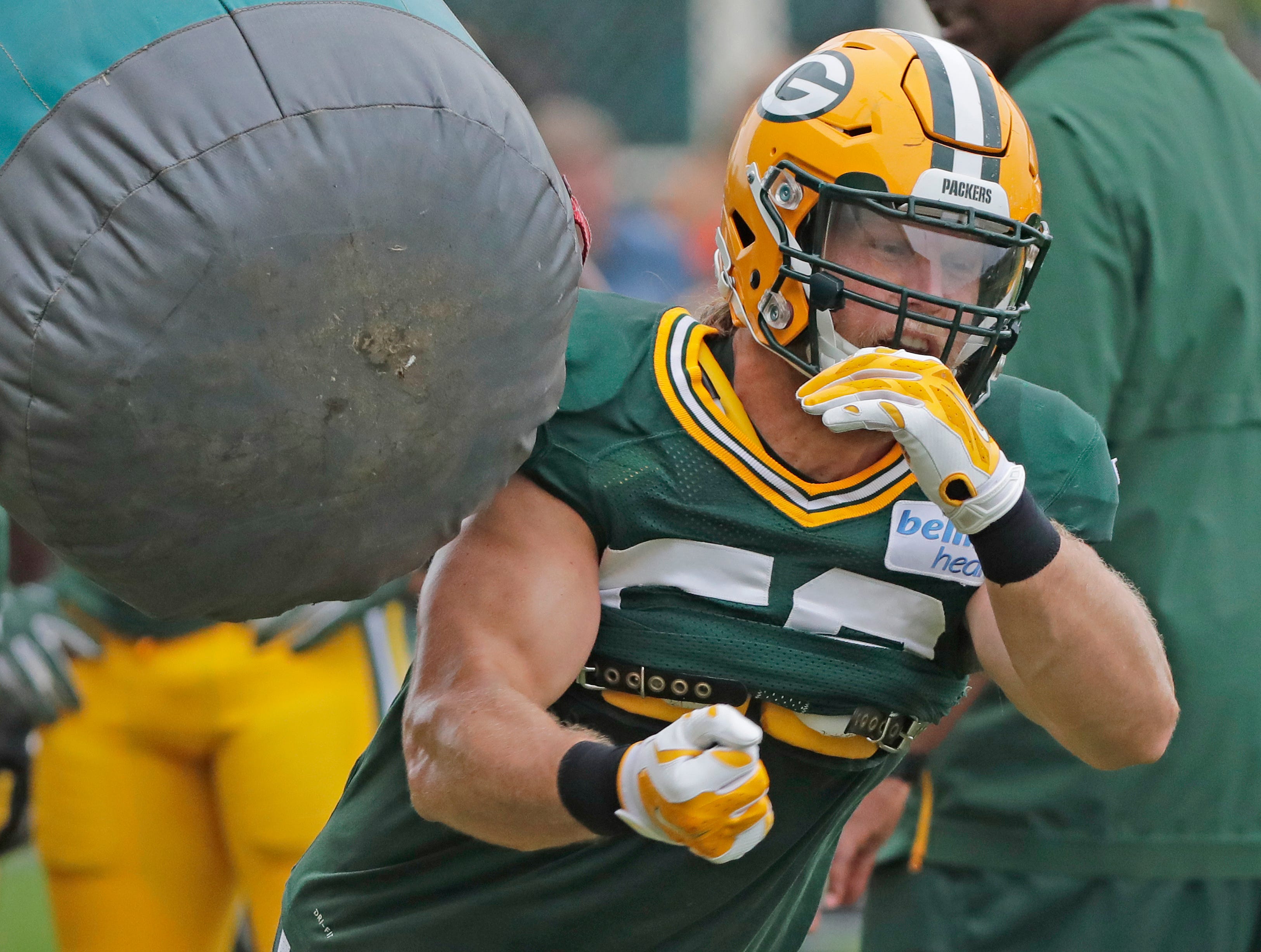 Green Bay Packers linebacker Clay Matthews (52) runs through a drill during training camp practice at Ray Nitschke Field on Monday, August 20, 2018 in Ashwaubenon, Wis.