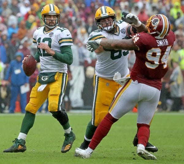 Green Bay Packers quarterback Aaron Rodgers (12) looks downfield as offensive tackle David Bakhtiari (69) blocks against Washington Sunday, September 23, 2018 at FedEx Field in Landover, MD. Jim Matthews/USA TODAY NETWORK-Wisconsin