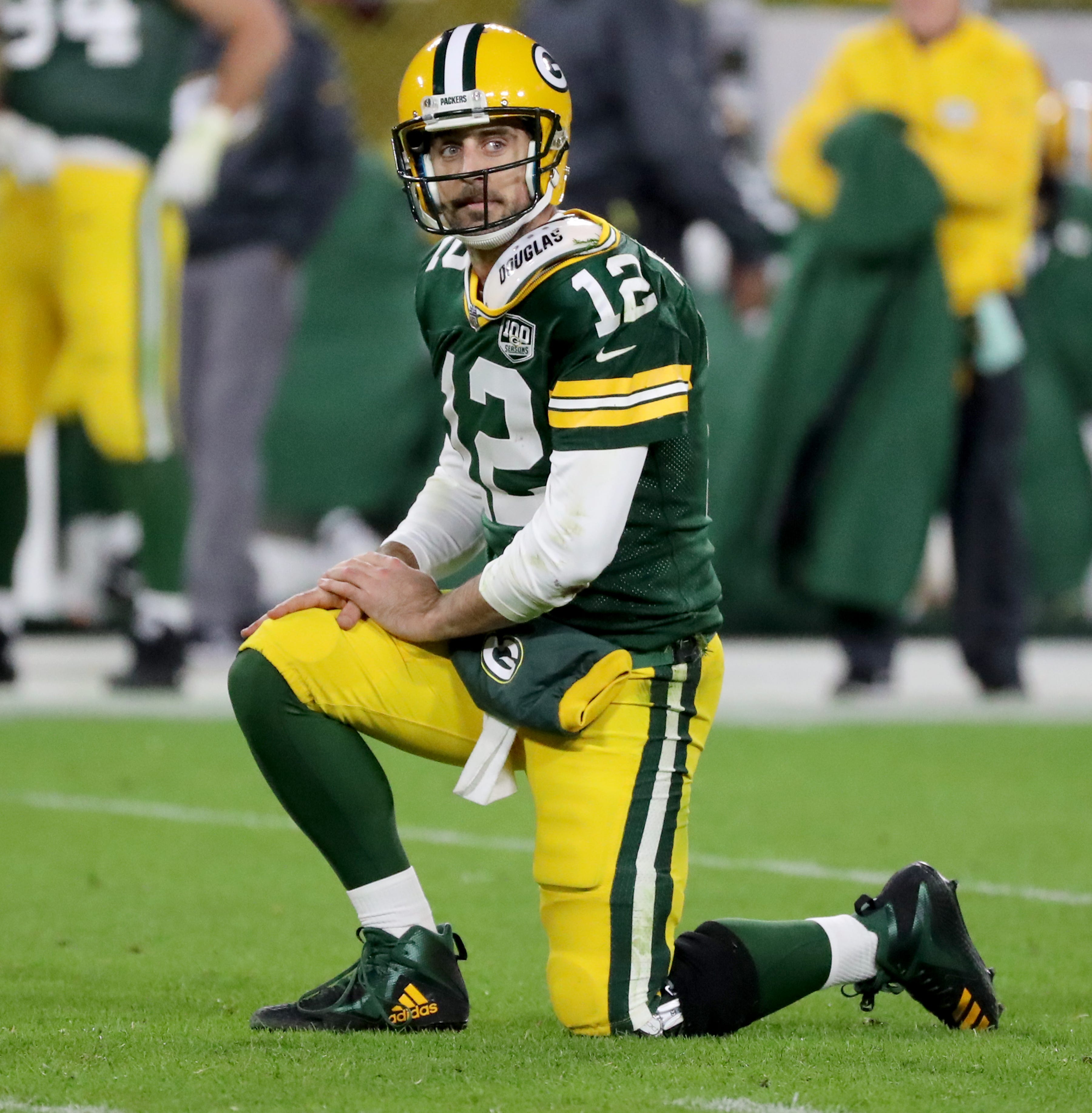 Green Bay Packers quarterback Aaron Rodgers (12) looks towards the referee after getting thrown down against the San Francisco 49ers at Lambeau Field Monday, October 15, 2018 in Green Bay, Wis.
