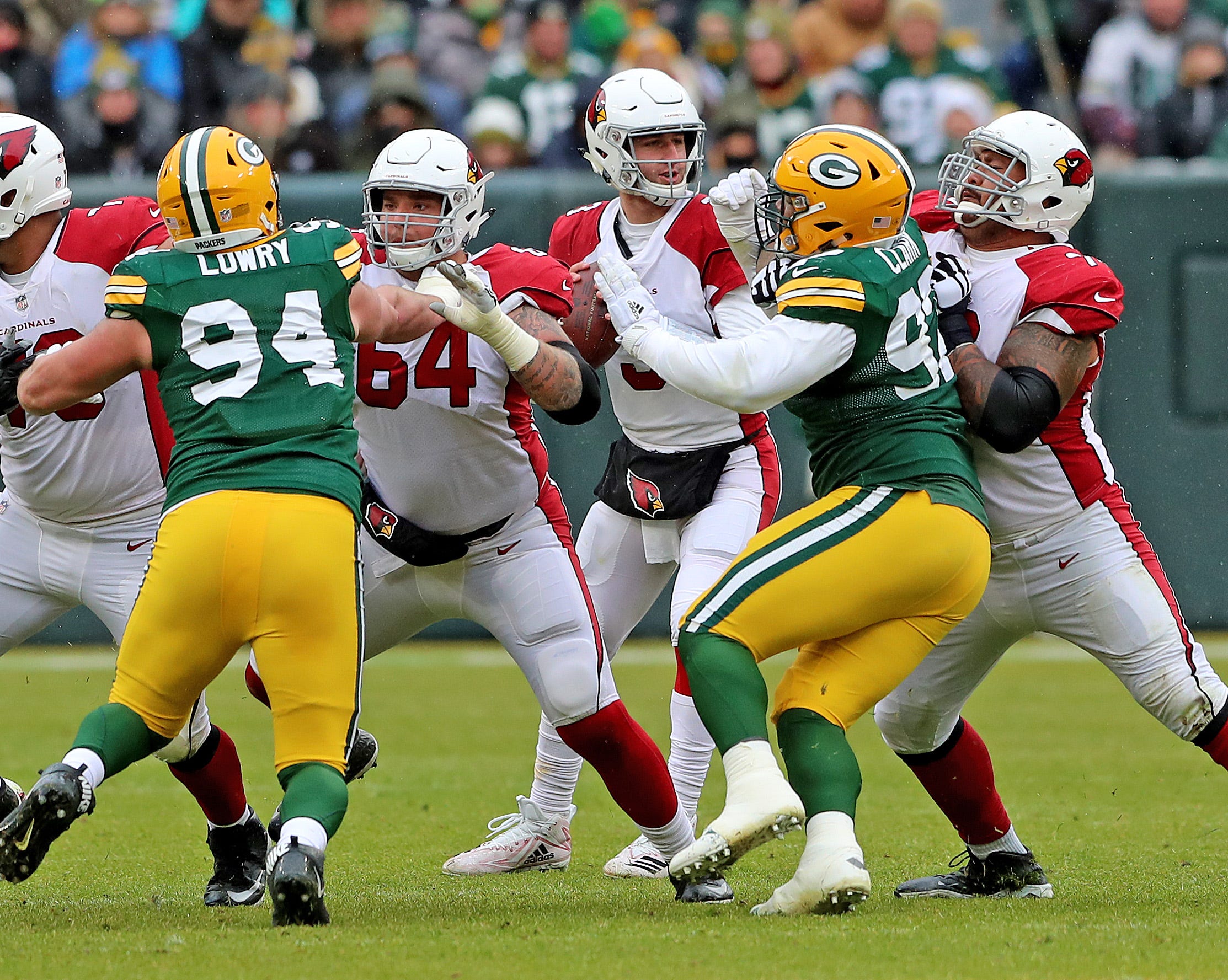 Green Bay Packers defensive end Dean Lowry (94) and nose tackle Kenny Clark (97) rush quarterback Josh Rosen (3) against the Arizona Cardinals Sunday, December 2, 2018 at Lambeau Field in Green Bay, Wis.
Jim Matthews/USA TODAY NETWORK-Wis