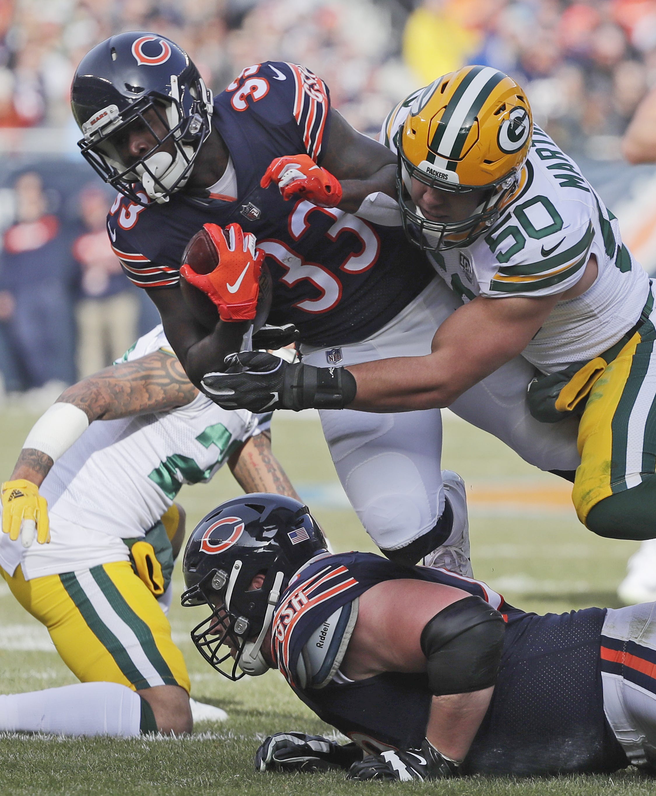 Green Bay Packers inside linebacker Blake Martinez (50) tackles Chicago Bears running back Taquan Mizzell (33) in the first quarter at Soldier Field on Sunday, December 16, 2018 in Chicago, Illinois.
Adam Wesley/USA TODAY NETWORK-Wis