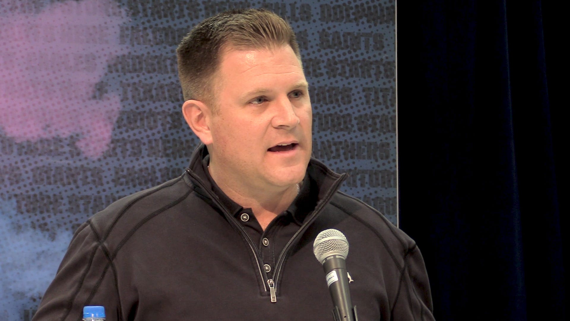 Packers general manager Brian Gutekunst fields questions at the scouting combine.