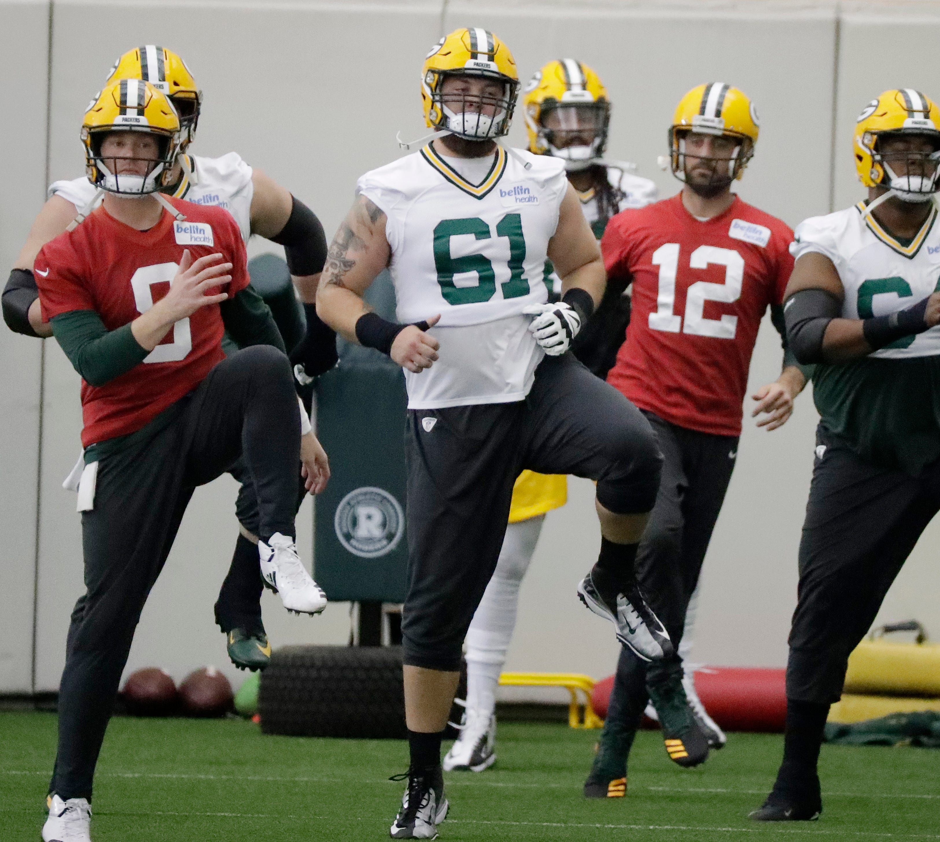 Green Bay Packers offensive guard Cole Madison (61) warms up during a team practice at the Don Hutson Center on Wednesday, April 24, 2019 in Ashwaubenon, Wis.