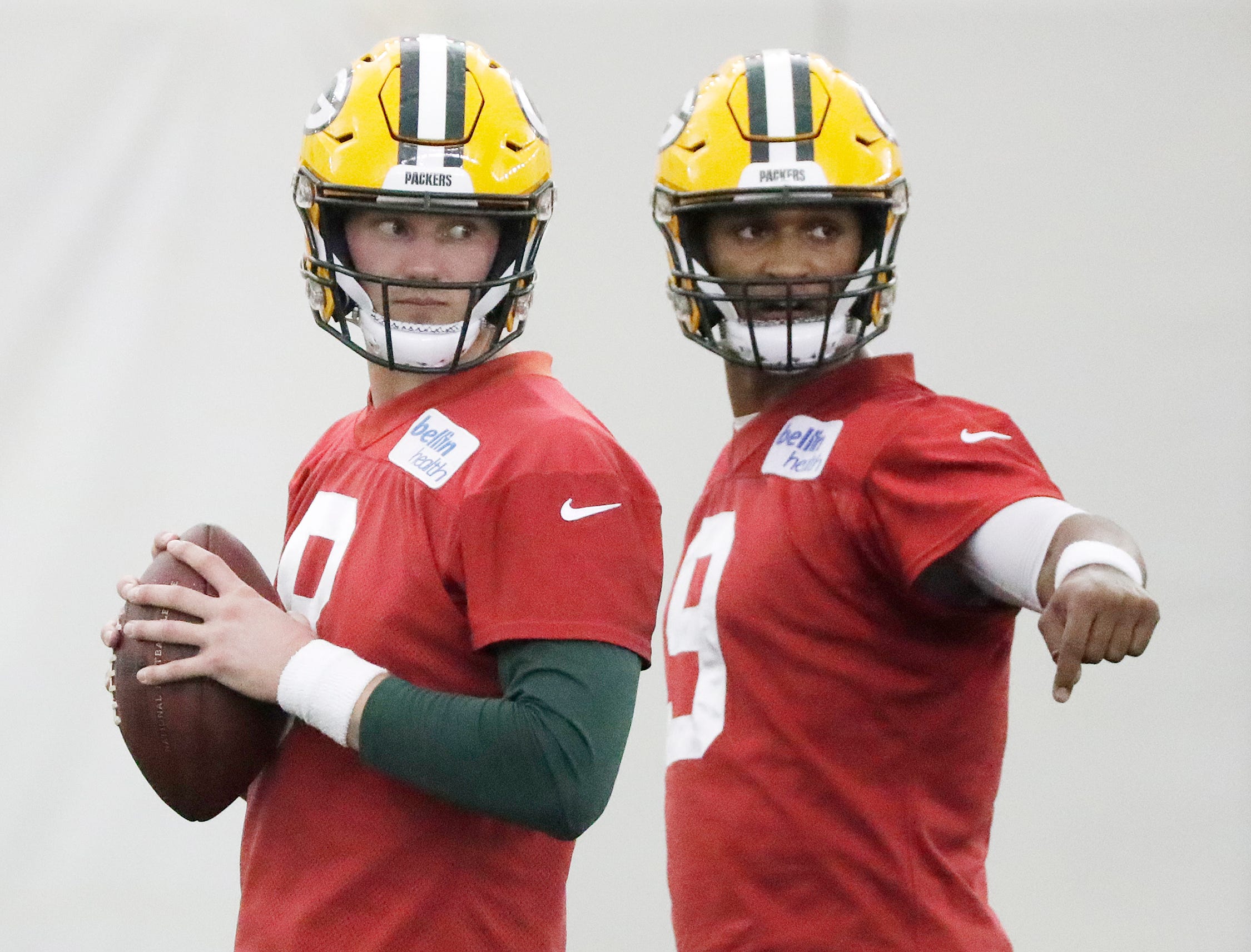 Green Bay Packers quarterback Tim Boyle (8) and quarterback DeShone Kizer (9) talk during a team practice at the Don Hutson Center on Wednesday, April 24, 2019 in Ashwaubenon, Wis.