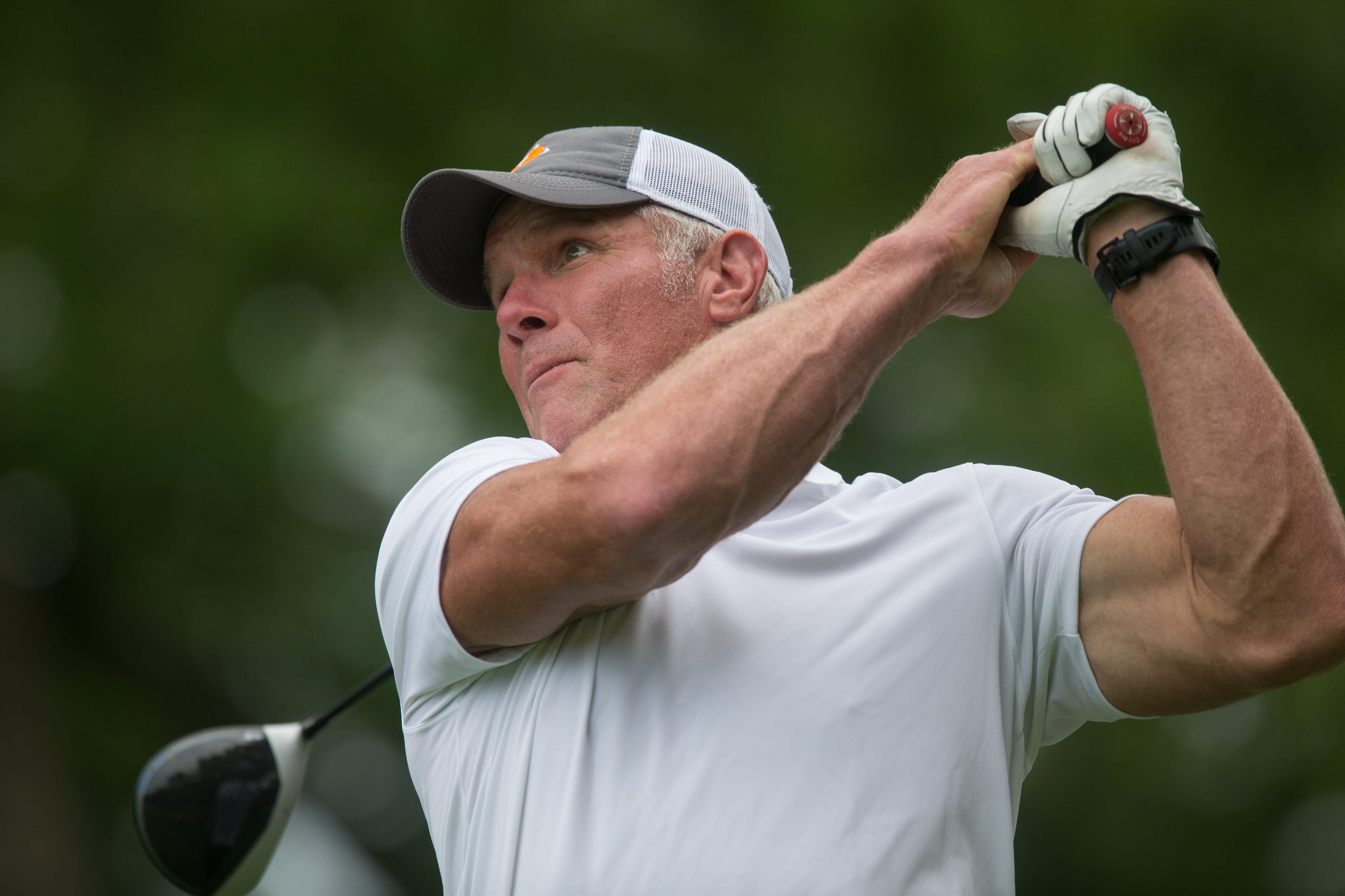Brett Favre tees off at the 16th hole.