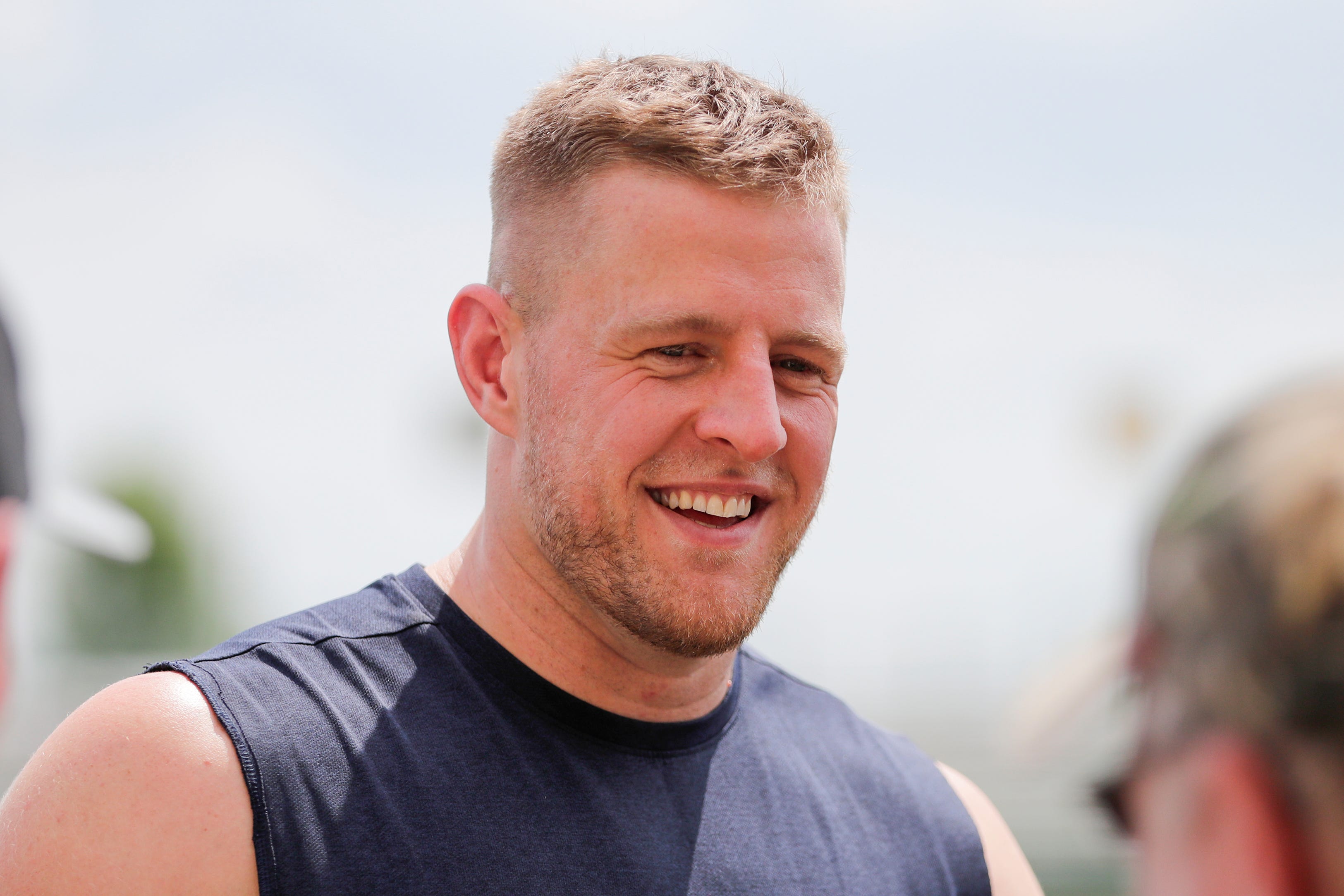 Texans defensive end J. J. Watt (99) talks to fans after a joint training camp practice with the Green Bay Packers at Ray Nitchske Field Monday, August 5, 2019, in Ashwaubenon, Wis.