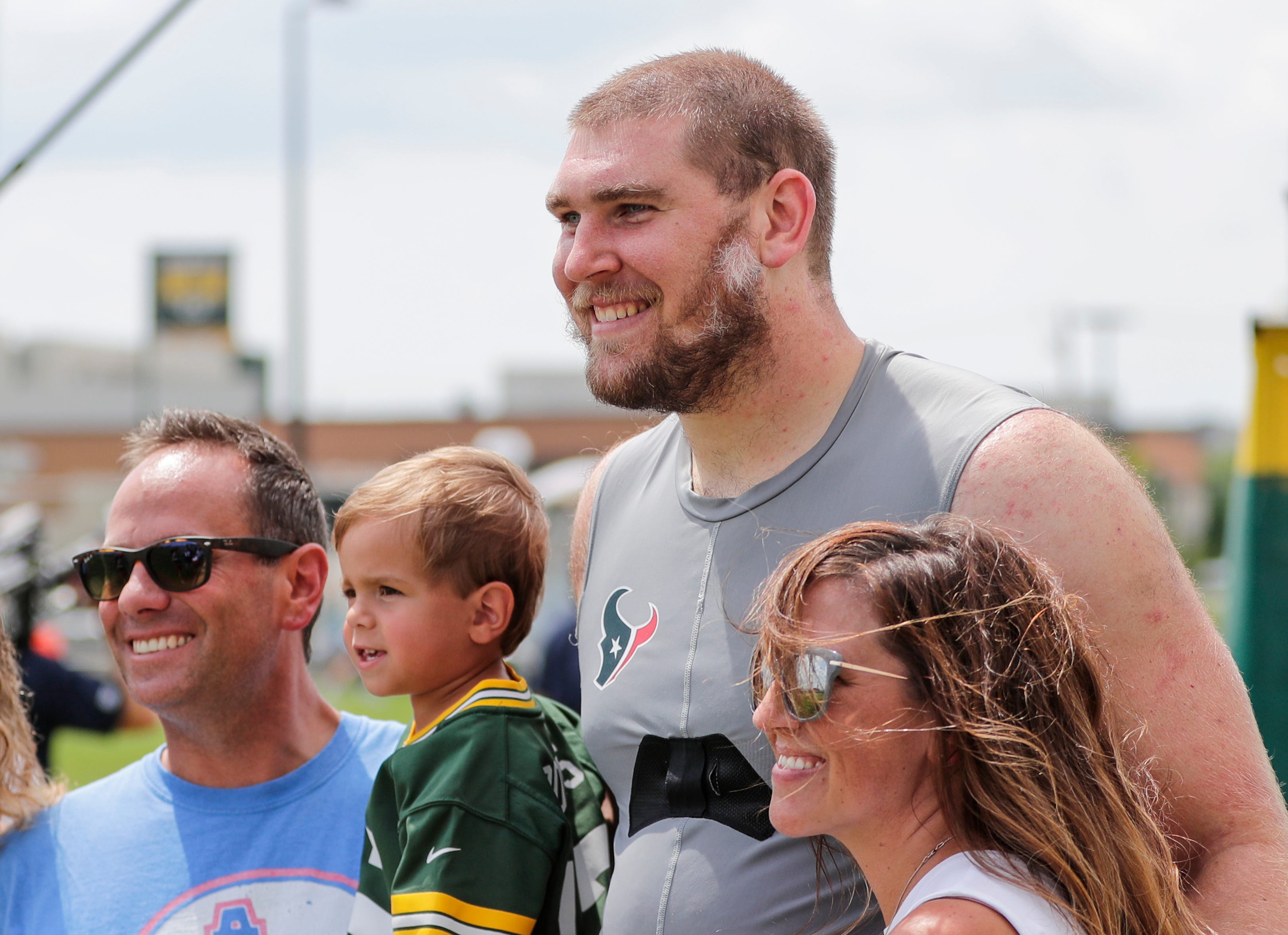 Texans tackle Max Scharping (74) meets with his fans after a joint training camp practice with the Green Bay Packers at Ray Nitschke Field Monday, August 5, 2019, in Ashwaubenon, Wis.
