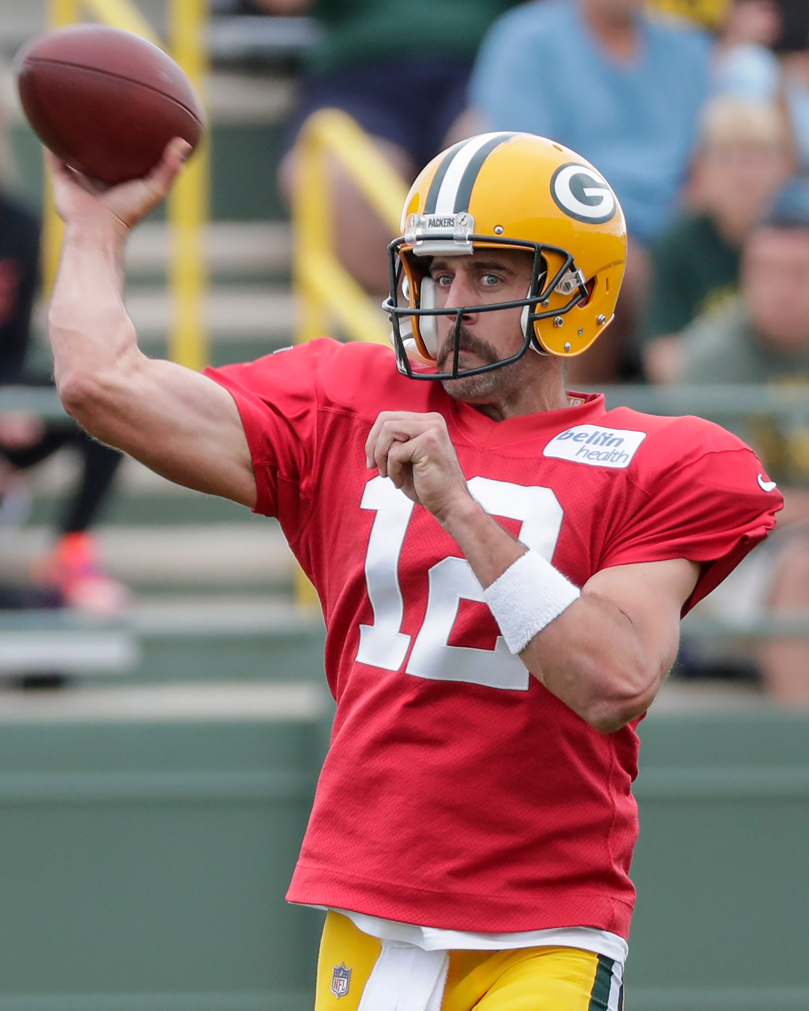 Green Bay Packers' Aaron Rodgers throws during training camp practice Tuesday, August 13, 2019, at Ray Nitschke Field in Ashwaubenon, Wis.