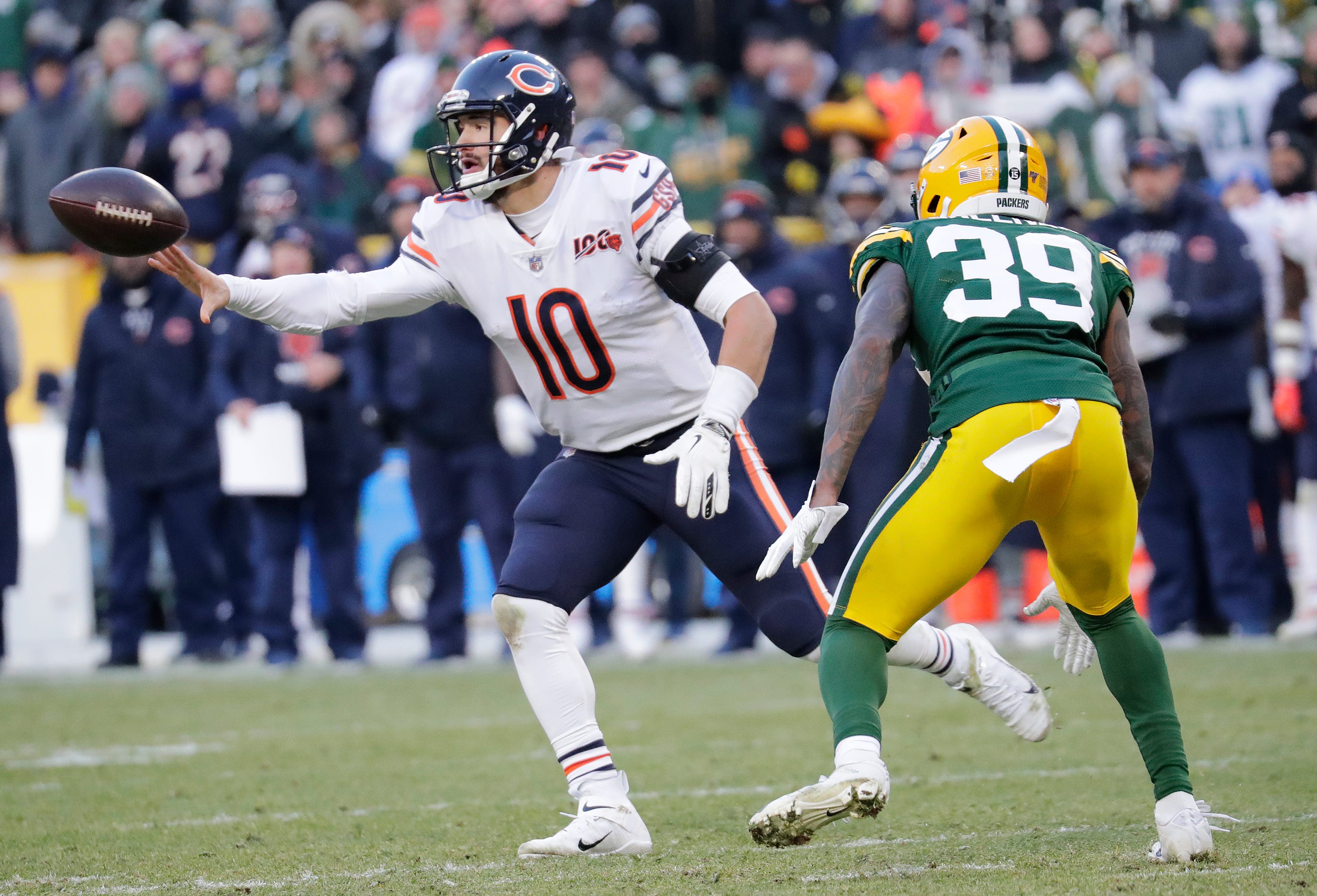 Chicago Bears quarterback Mitchell Trubisky (10) laterals the ball on the last play of the game against Green Bay Packers defensive back Chandon Sullivan (39) Sunday, December 15, 2019, at Lambeau Field in Green Bay, Wis.