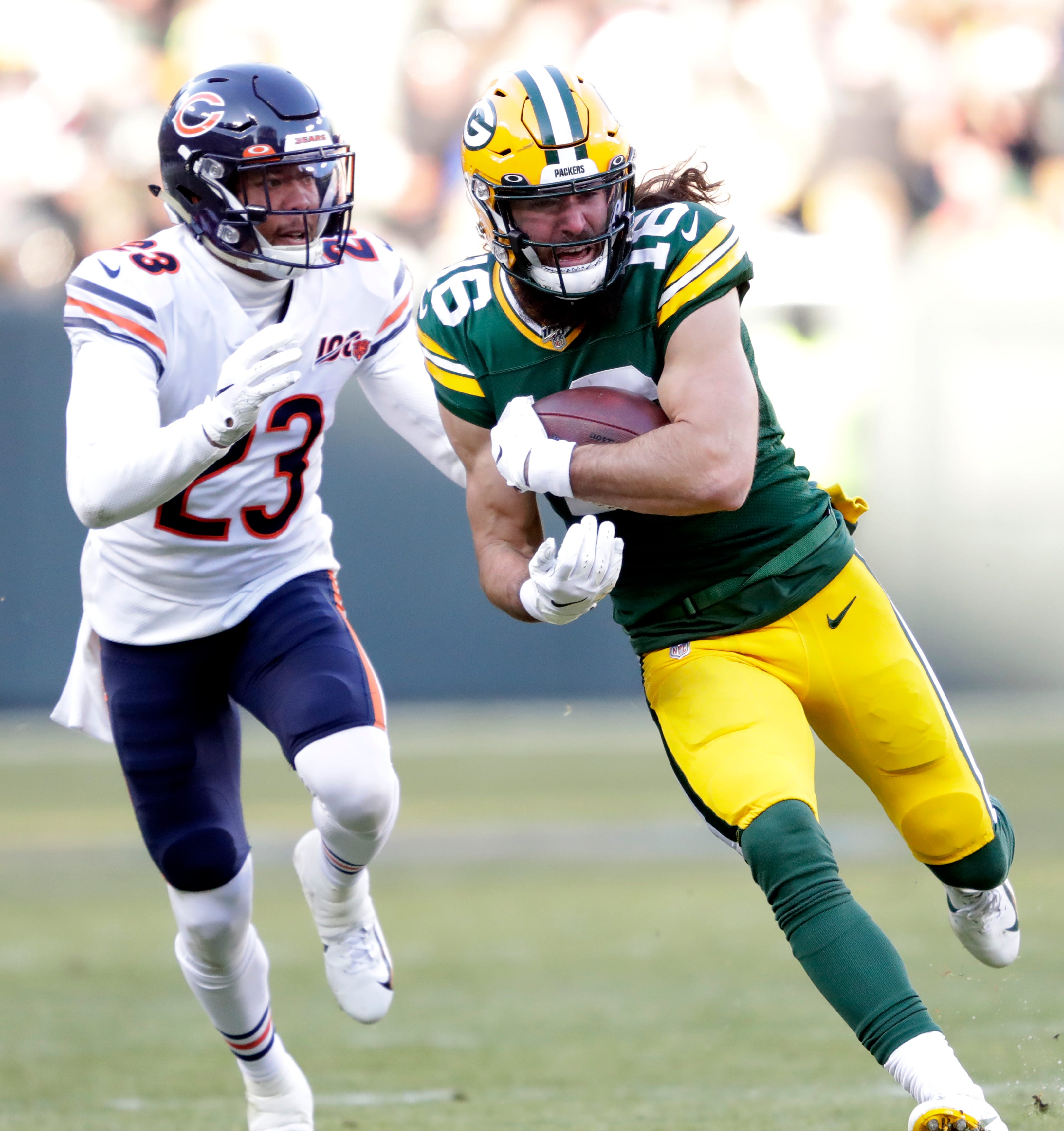 Green Bay Packers wide receiver Jake Kumerow (16) runs for a first down on a long reception against Chicago Bears cornerback Kyle Fuller (23) in the third quarter Sunday, December 15, 2019, at Lambeau Field in Green Bay, Wis.