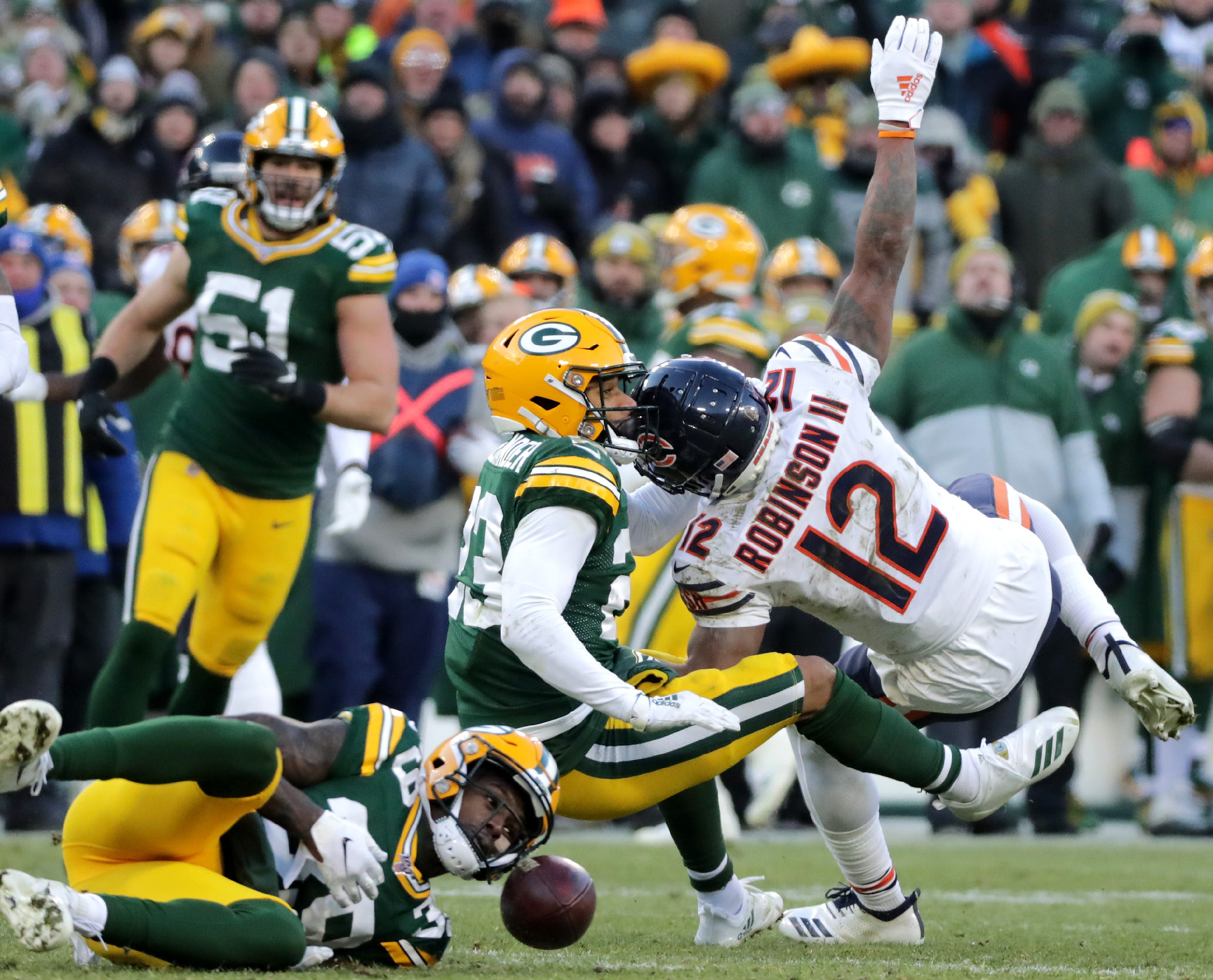 Green Bay Packers cornerback Jaire Alexander (23) and defensive back Chandon Sullivan (39) break up a a pass intended for Chicago Bears wide receiver Allen Robinson (12) on the final drive during their football game on Sunday, December 15, 2019, at Lambeau Field in Green Bay, Wis.