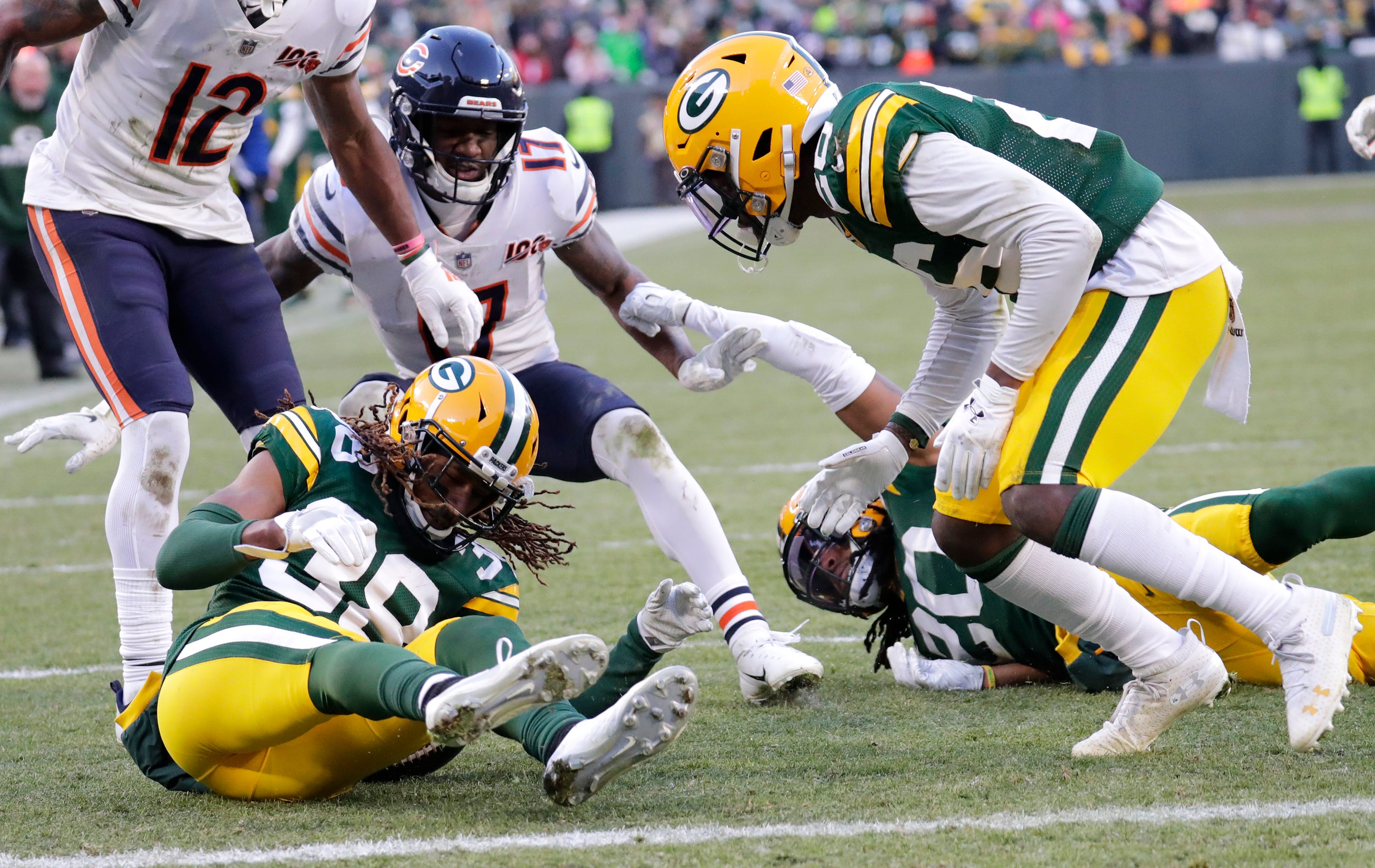 Green Bay Packers cornerback Tramon Williams (38) recovers the ball on the last play of the game to seal the victory against the Chicago Bears Sunday, December 15, 2019, at Lambeau Field in Green Bay, Wis.