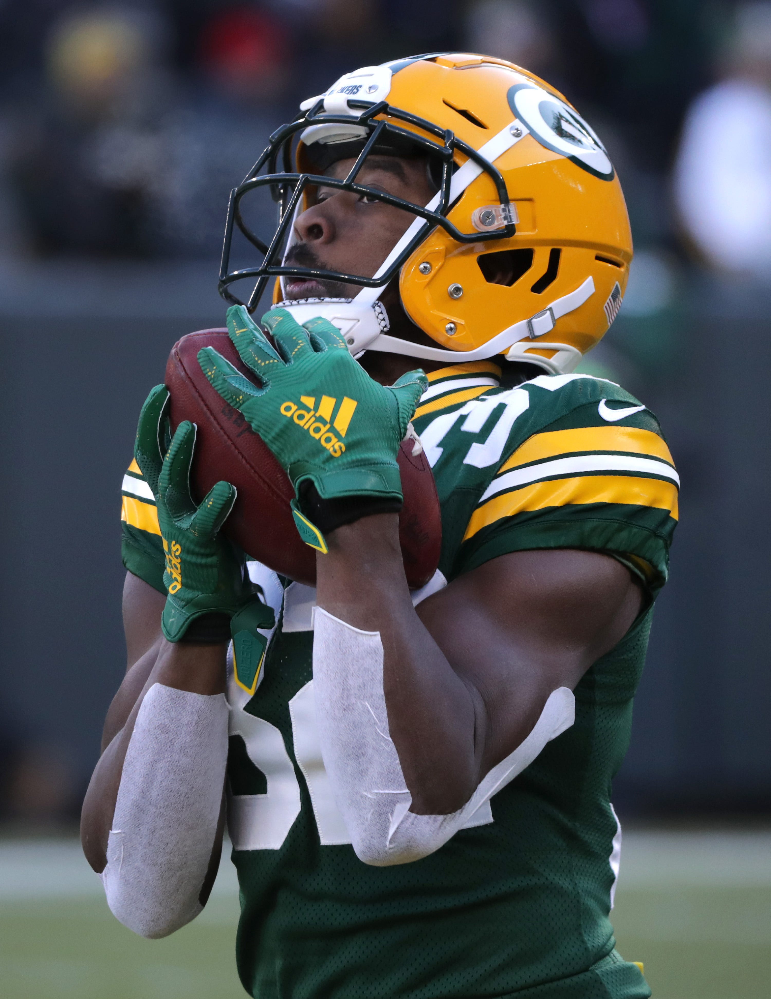 Green Bay Packers running back Tyler Ervin (32) warms up before the Packers host the Chicago Bears on Sunday, December 15, 2019, at Lambeau Field in Green Bay, Wis.