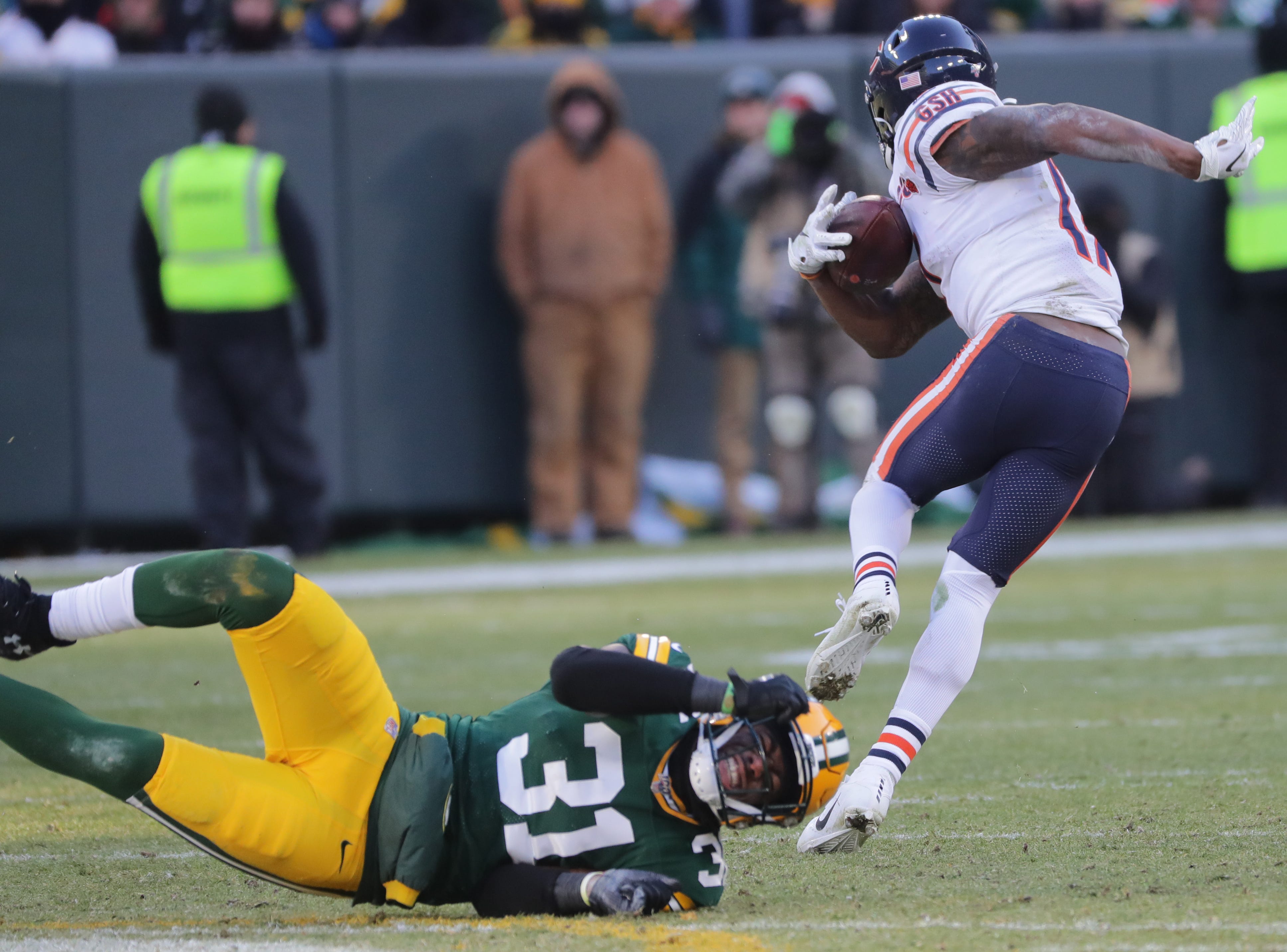 Green Bay Packers strong safety Adrian Amos (31) misses a fingertip tackle on Chicago Bears wide receiver Anthony Miller (17) during the fourth quarter of their game Sunday, December 15, 2019 at Lambeau Field in Green Bay, Wis. The Green Bay Packers beat the Chicago Bears 21-13.